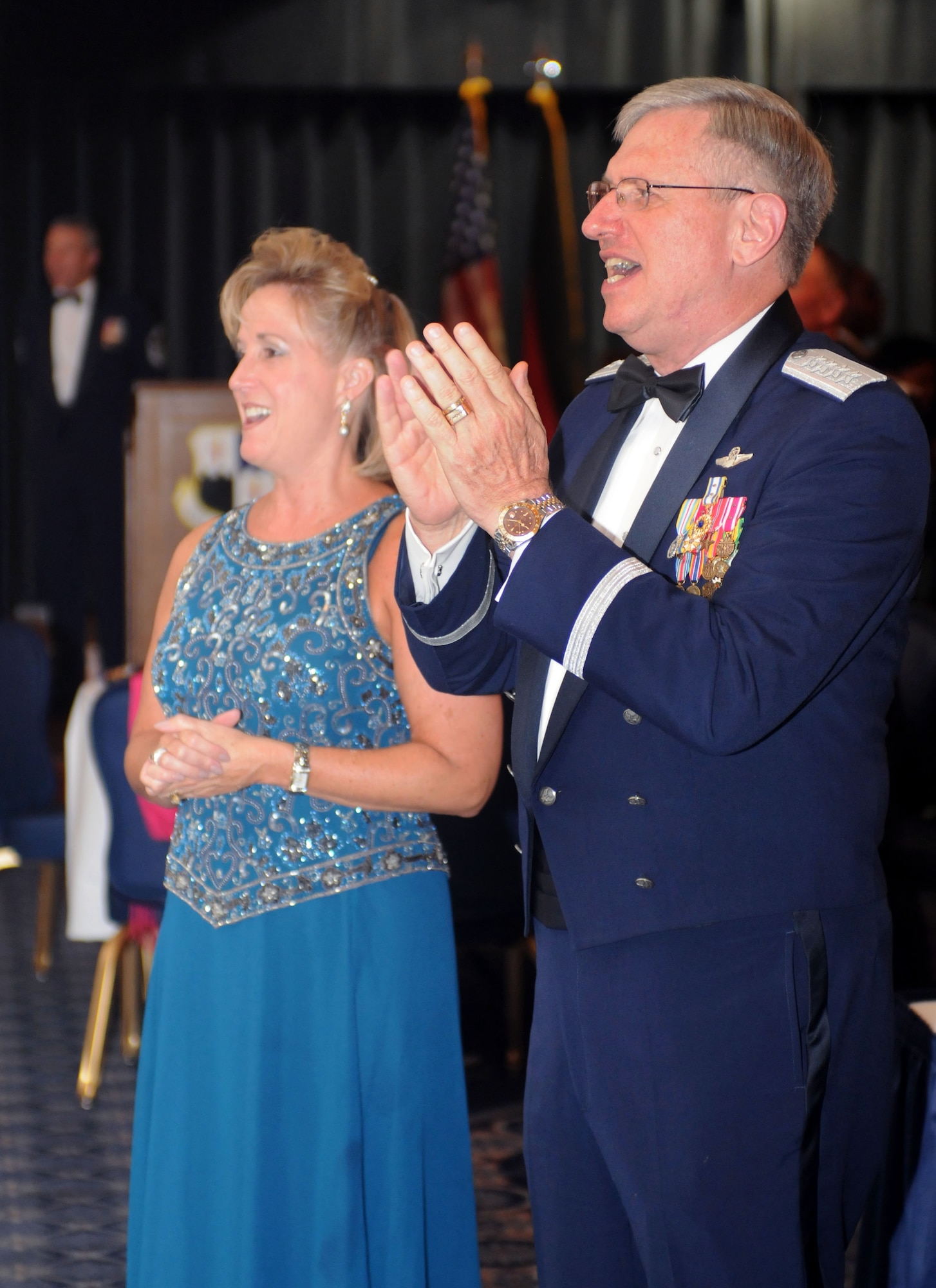 Gen. Roger A. Brady, U.S. Air Forces in Europe commander, sings the Air Force song with Ann Wagner, U.S.  Ambassador to Luxembourg, during the Air Force Ball held on Spangdahlem Air Base, Germany, Sept. 20, 2008. The 2008 Air Force Ball commemorates the Air Force’s 61st birthday. (U.S. Air Force photo by Master Sgt. Alexander Ray)