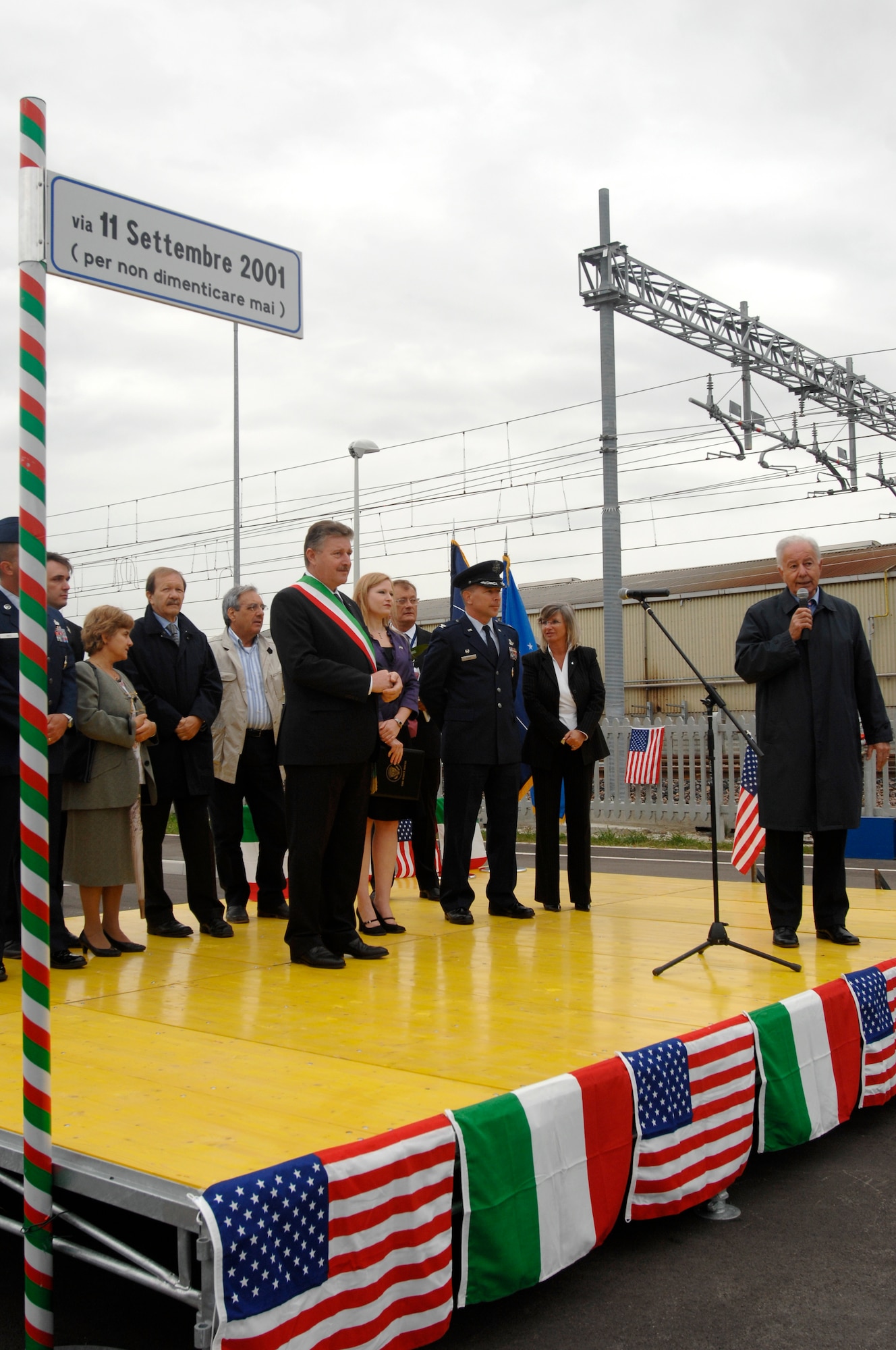 Mario Simionato, Alderman under the Spinea mayor, speaks to nearly 300 people Sept. 21, 2008 following the unveiling of the new street sign "Via 11 settembre 2001." Several Italian and U.S. representatives spoke about the importance of the ceremony and remembering those who died during the terrorist attacks on Sept. 11, 2001. (U.S. Air Force photo/Airman 1st Class Ashley Wood)    
