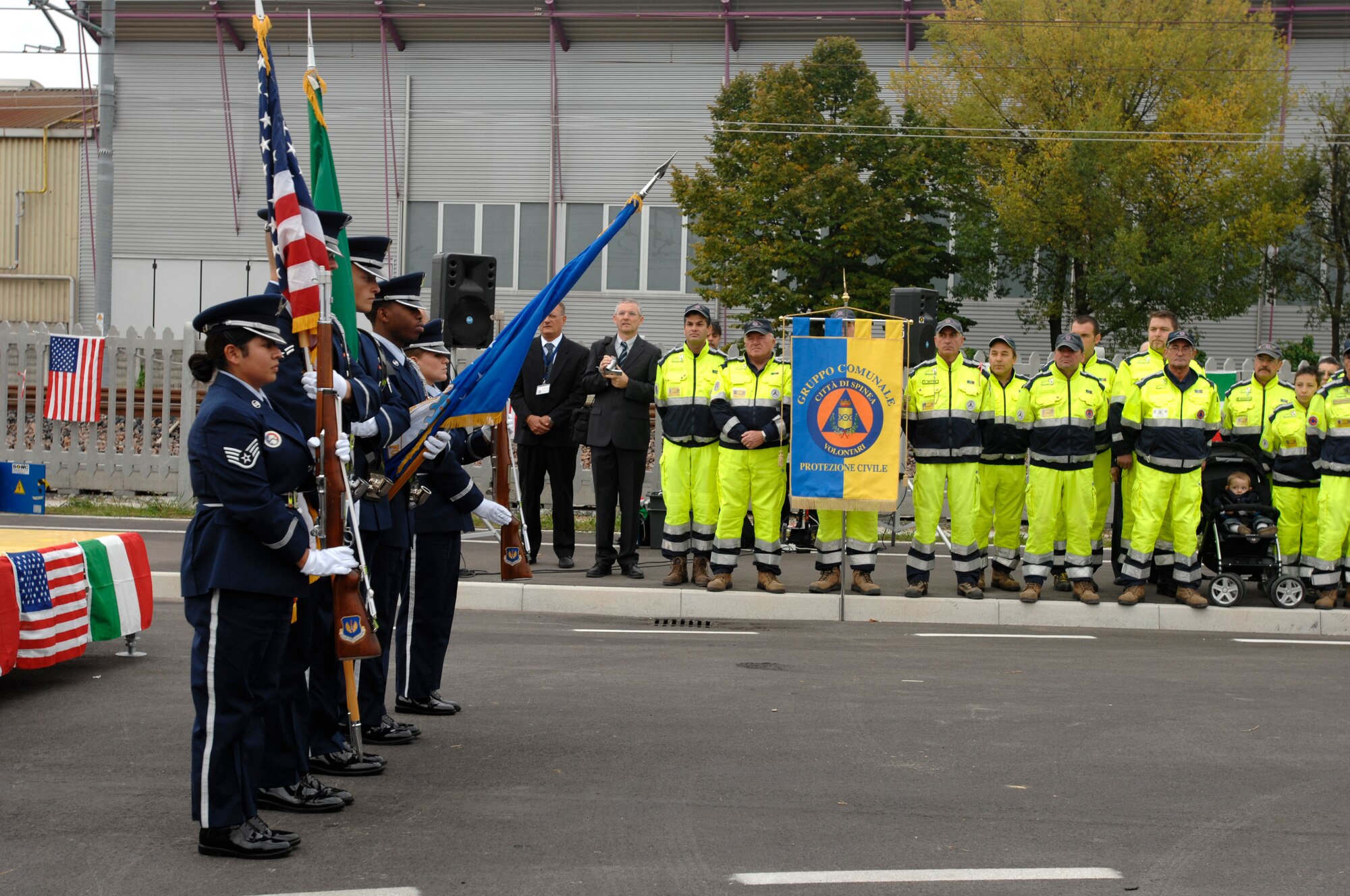 Members of the 31st Fighter Wing honor guard present the colors during the national anthem at a street naming ceremony Sept. 21, 2008 in Spinea, Italy. Nearly 300 U.S. and Italian citizens attended the ceremony which took place next to the Spinea train station. The street was named in honor of the victims of the Sept. 11, 2001 terrorist attacks.  (U.S. Air Force photo/Airman 1st Class Ashley Wood)  