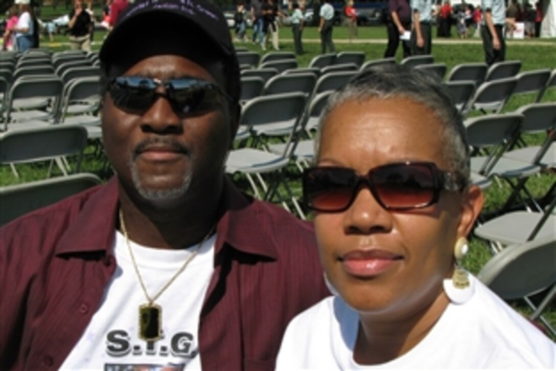 Garry M. Green Sr. and his wife, Yvonne, from Rosedale, Md., pose for a photo as the crowd departs the third annual “A Time of Remembrance” ceremony in Washington, D.C., Sept. 20, 2008. The couple attended the event to celebrate the memory of their daughter, Army Spc. Toccara R. Green who died at age 23 on Aug. 14, 2005, when her convoy encountered roadside bombs in Asad, Iraq.