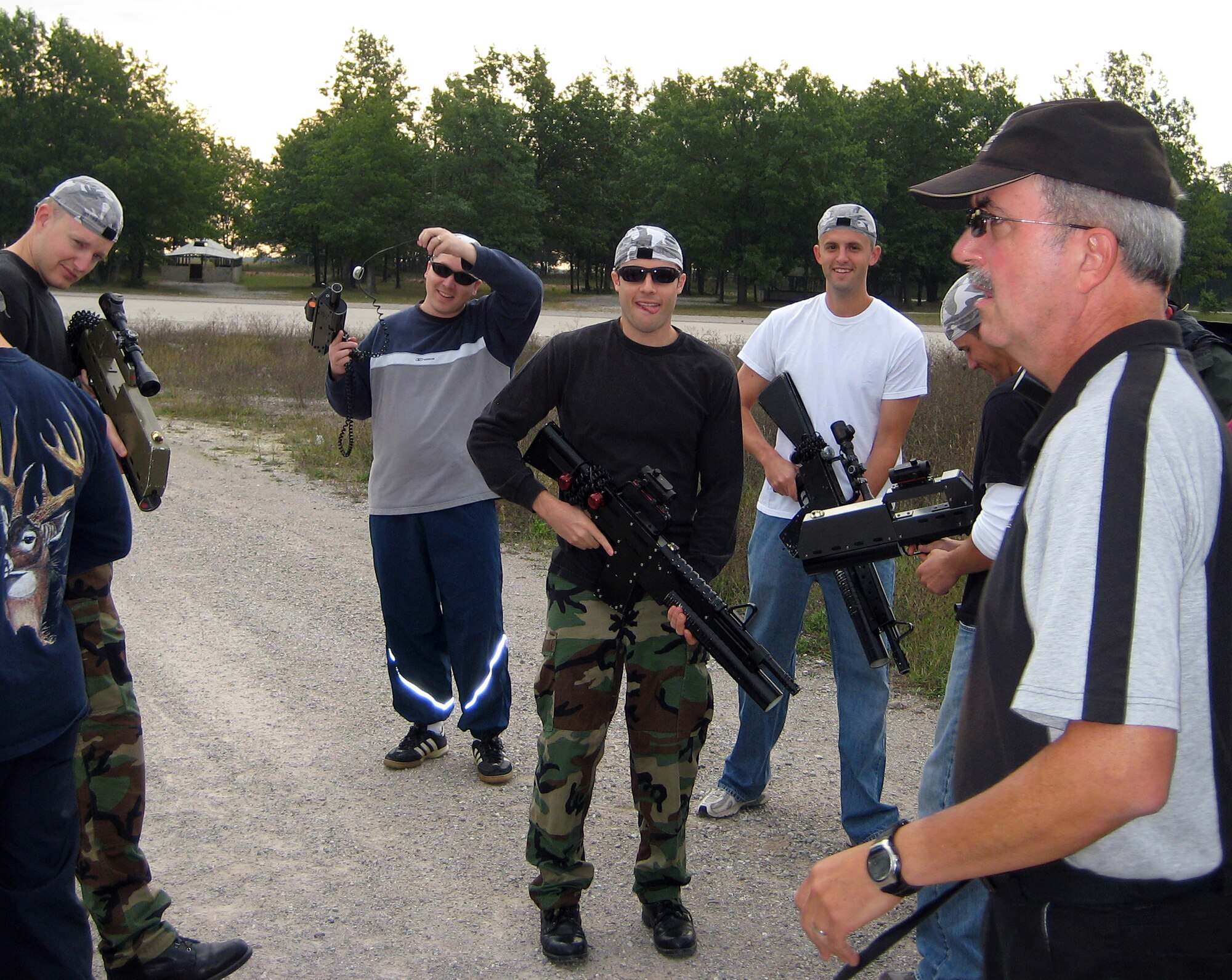 Instructor pilots and maintainers with Vance’s 32d Flying Training Squadron, get ready for the small-unit tactics laser-tag challenge in a mock insurgent town at the Combat Readiness Training Center in Alpena, Mich. The 32nd FTS participated in a training deployment Sept. 19-22 at Alpena. (U.S. Air Force photo)