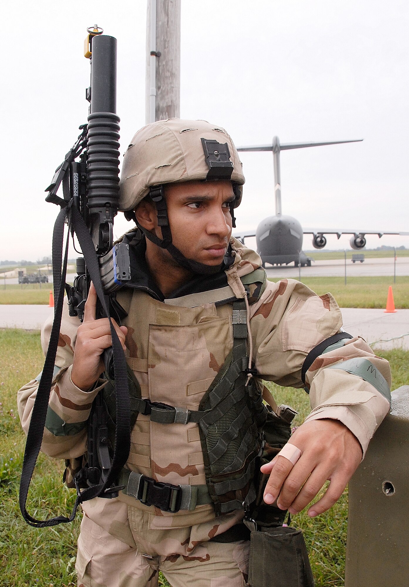 Staff Sgt. Charvis Mills, a 442nd Security Forces Squadron fire-team member, keeps alert as a questionable vehicle approaches his entry control point during the 442nd Fighter Wing's September 2008 unit training assembly operational readiness exercise. The 442nd FW is an Air Force Reserve Command A-10 Thunderbolt II unit based at Whiteman Air Force Base, Mo. (US Air Force photo/Staff Sgt. Kent Kagarise)