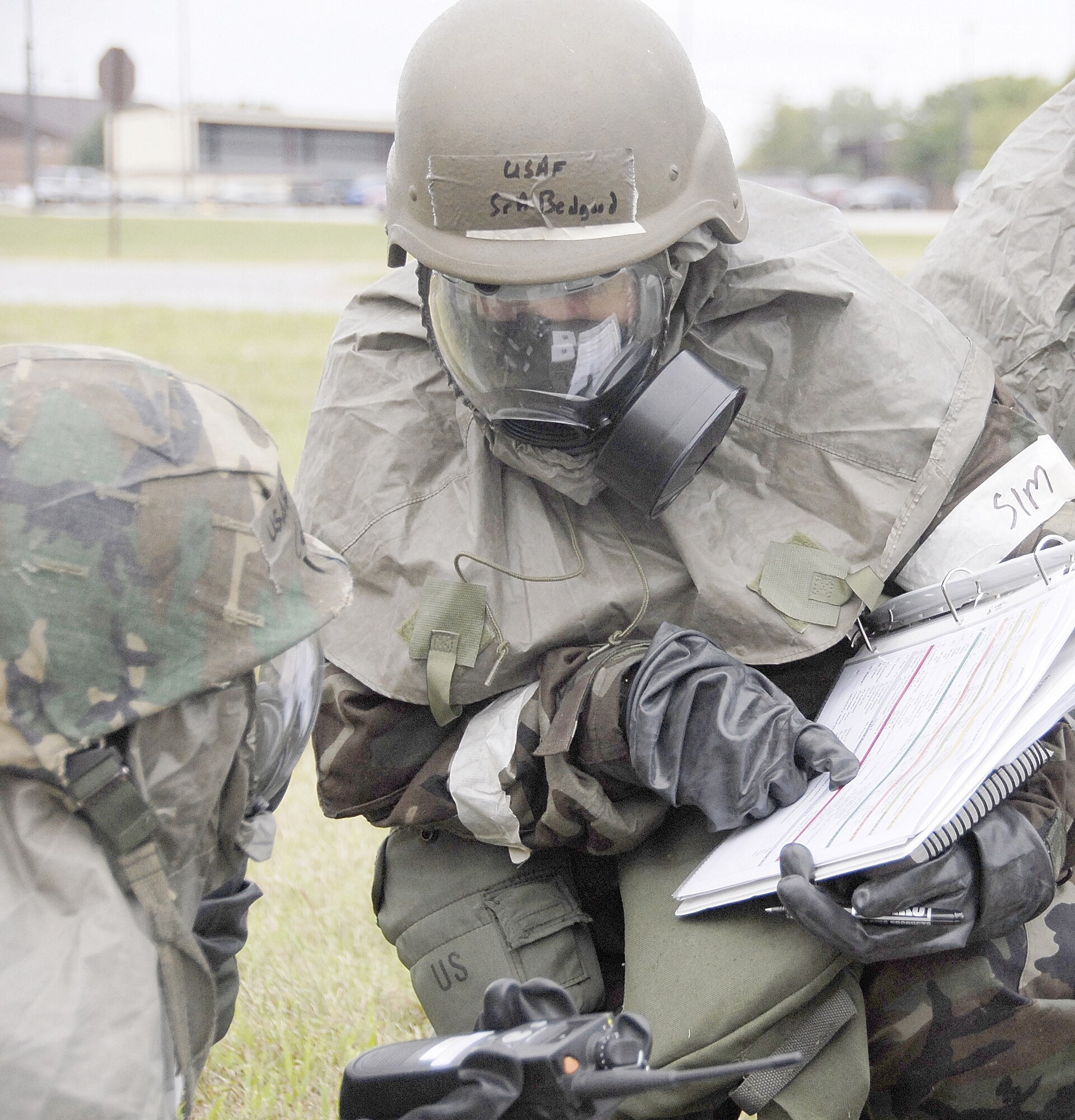 Senior Airman Joanna Bedgood, 442nd Medical Squadron, takes care of the bookwork while under mission-oriented-protection-posture-level-four conditions during September 2008's unit training assembly operational readiness exercise. The 442nd FW is an Air Force Reserve Command A-10 Thunderbolt II unit based at Whiteman Air Force Bace, Mo. (US Air Force photo/Staff Sgt. Kent Kagarise). 