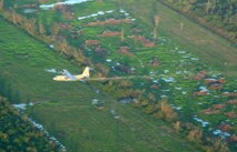 BATON ROUGE, La—- An Air Force Reserve C-130 assigned to the 910th Airlift Wing Youngstown, Ohio aerial spray LaFourche Parish September 21 in Southern Louisiana as part of disaster relief efforts to help area residents.  C-130s are required to fly at only 150 feet above ground to effectively eradicate mosquito infestations eliminating the potential for the spread of West Nile Virus and Encephalitis.  Aerial spraying will continue for the next week ultimately spraying nearly 900,000acres. Photo by Calvin Telleson (FEMA Broadcast Operations)