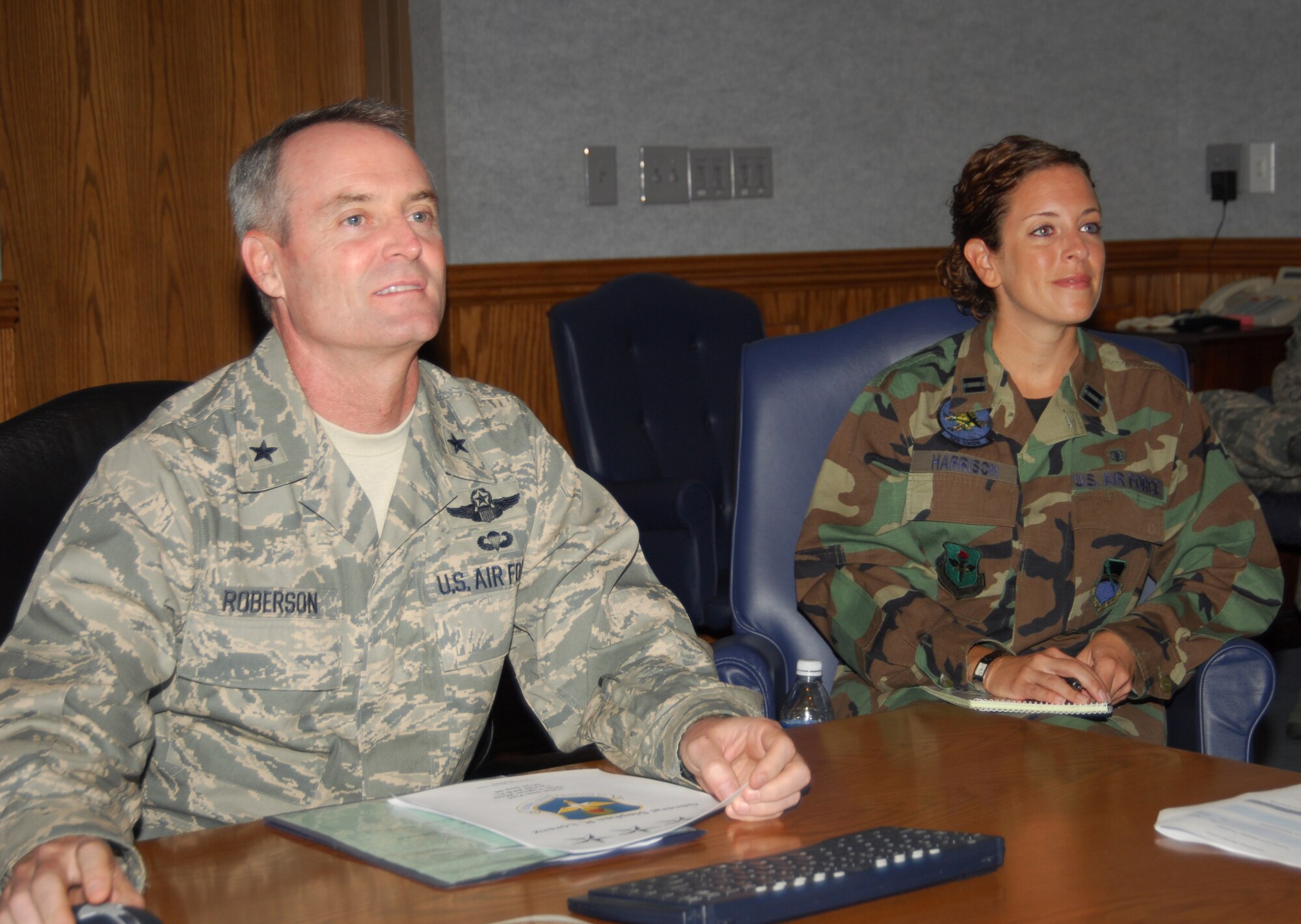 Captain Jennifer Harrison, 325th Aero Medical Dental Squadron Interim Dental Operations Flight commander and dentist, shadows Brig. Gen. Darryl Roberson, 325th Fighter Wing commander, during the commander’s staff meeting here today.  Captain Harrison is responsible for more than 2,000 Airmen’s oral health and has championed oral health prevention programs for the entire base community.  She also has volunteered for programs across the spectrum.  Captain Harrison spent the day with General Roberson as part of the Commander’s Shadow Program.  She has served three years in the military and is a native of Lakeville, Minn.
