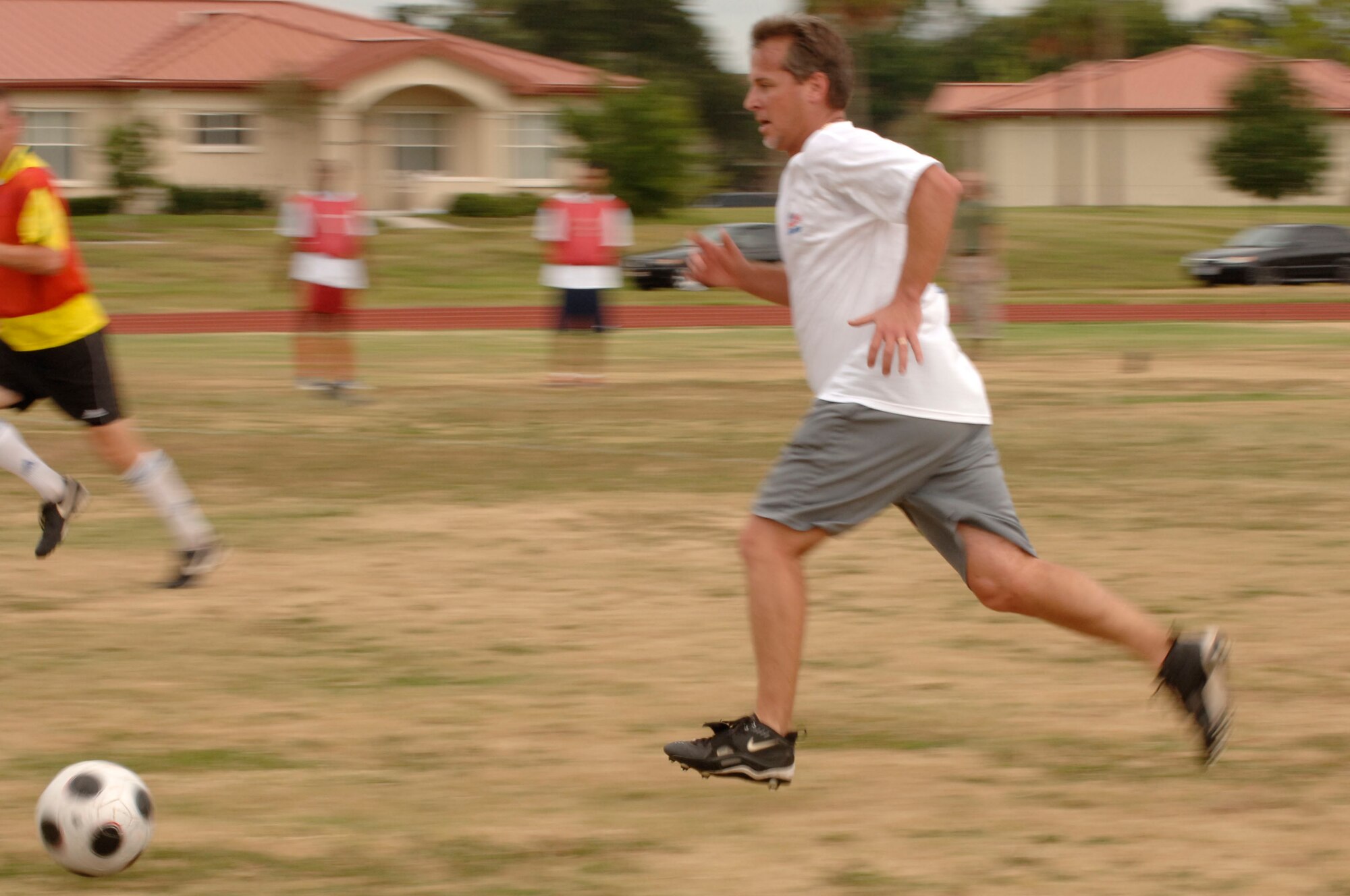Keith Pilawsky, 6th Services sports director, runs down the field in an attempt to score a goal during an intramural soccer game at MacDill's fitness center Sept. 22.  (U.S. Air Force Photo By SrA Nancy Hooks) (released)