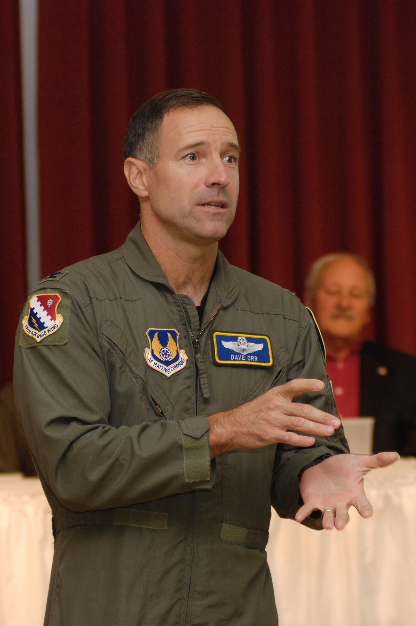 HANSCOM AFB, Mass. – Col. David Orr, 66th Air Base Wing commander, introduces the speakers for the first Heritage of Freedom event at the Minuteman Club Sept. 19. The event featured presentations from three local veterans who spoke of their individual stories of service during World War II, Vietnam, and operations Desert Storm and Allied Force. (U.S. Air Force photo by Walter Santos)