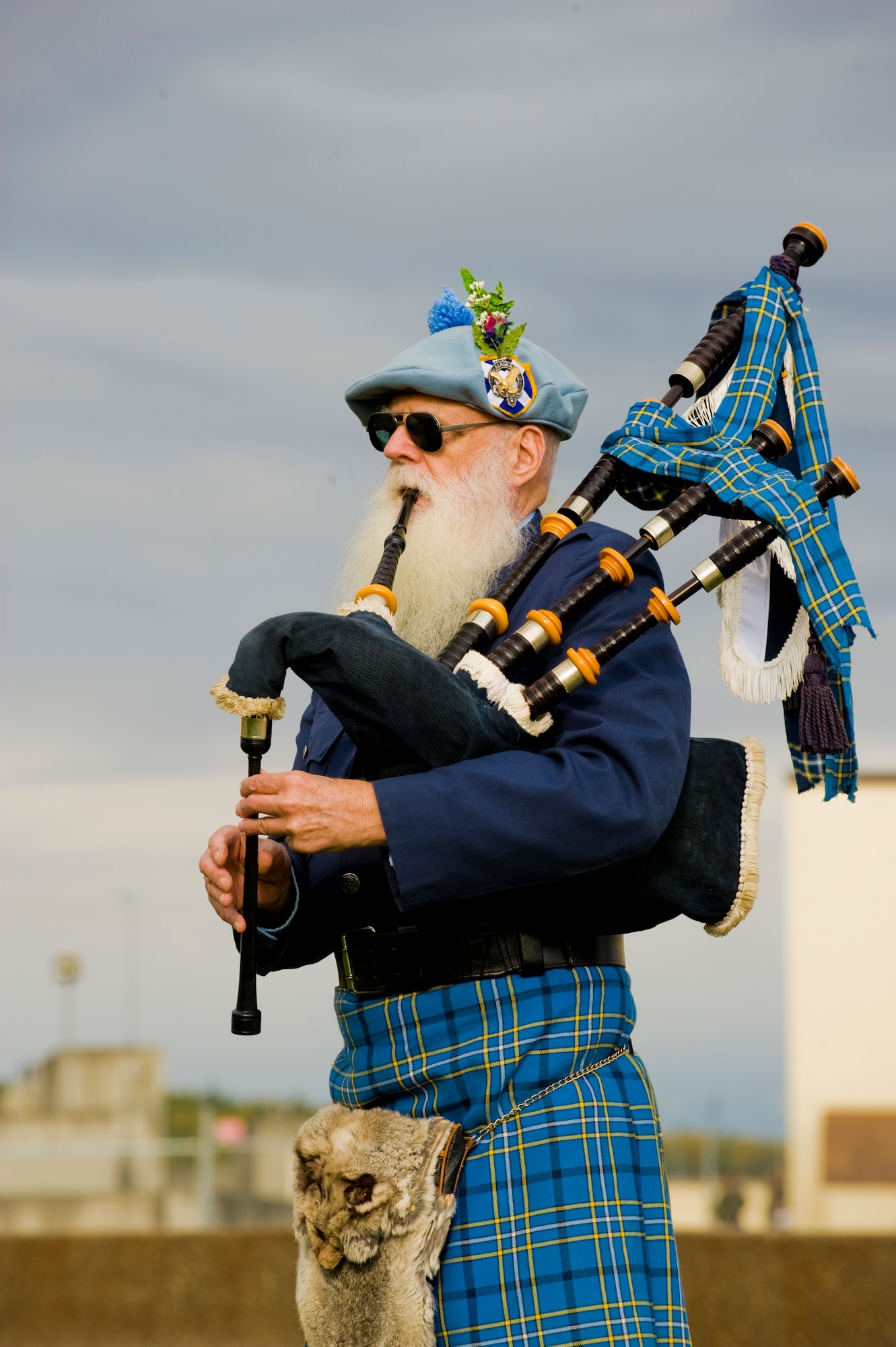 ELMENDORF AIR FORCE BASE, Alaska -- Fielder George Dowding, a member of the Alaskan Highlanders, plays "Amazing Grace" on the bagpipes during the POW/MIA Ceremony Sept 19. The ceremony honored fallen servicemembers as well as those who are still prisoners or war and missing in action. (U.S. Air Force photo/Staff Sgt. Joshua Garcia)
