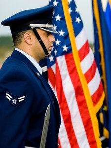 ELMENDORF AIR FORCE BASE, Alaska -- Airman 1st Class Richard Hernandez, a member of the 3rd Wing Base Honor Guard, stands by during the posting of the colors for the POW/MIA Ceremony Sept. 19. The ceremony recognized those servicemembers who have paid the ultimate sacrifice for the United States and those who are still under POW/MIA status. All branches of the military participated in the ceremony. (U.S. Air Force photo/Staff Sgt. Joshua Garcia)