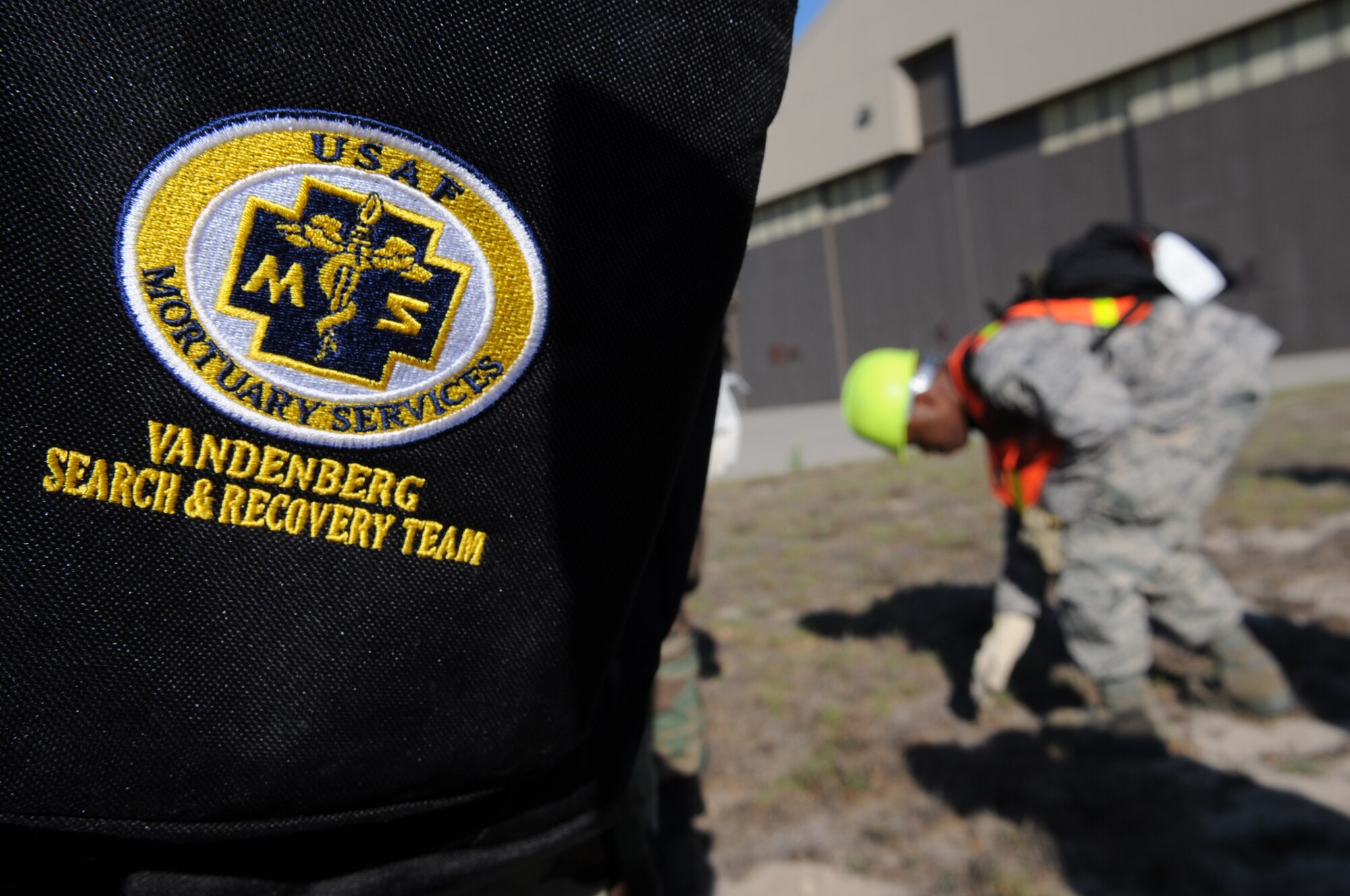 VANDENBERG AIR FORCE BASE, Calif-- Airmen with the Vandenberg Search and Recovery Team search for remains after a simulated C-17 crash Sept. 17 here.  The Operational Readiness Inspection team inspects Airmen performing their jobs and skills necessary to accomplish tasks during real world events.  (U.S. Air Force photo/Airman 1st Class Andrew Satran)