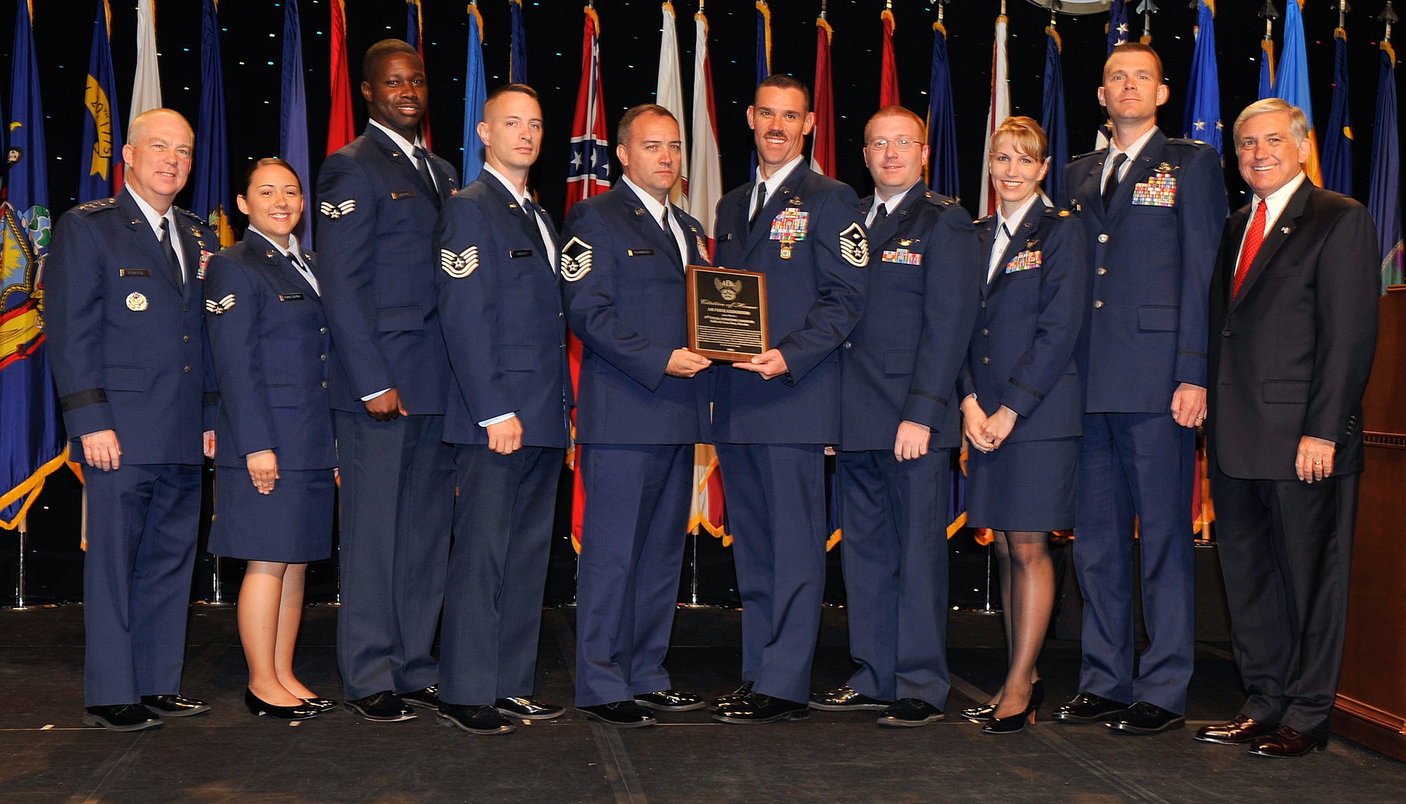 Airmen of the 3rd Special Operations Squadron receive the Citation of Honor at the Air Force Association's 2008 Air and Space Conference and Technology Exposition from Lt. Gen. Donald C. Wurster (far left) and Robert Largent (far right) Sept. 10 in Washington, D.C. The Citation of Honor was awarded to the 3rd SOS for its contribution to the development of aerospace power for the betterment of mankind. General Wurster is the Air Force Special Operations Command commander, and Mr. Largent is the Air Force Association chairman (U.S. Air Force photo/Michael Pausic) 