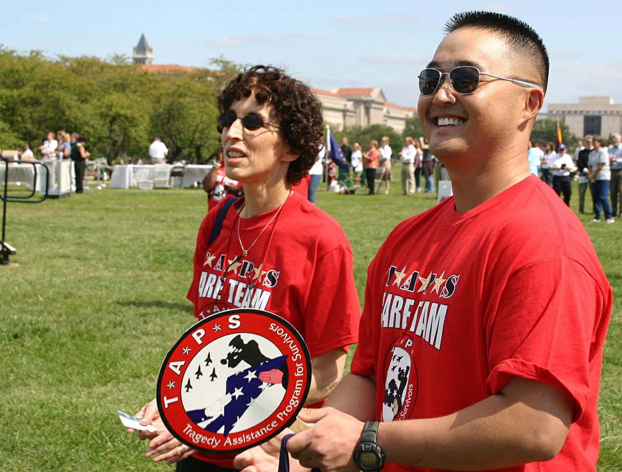 Retired Lt. Col. Charlie Brown (left) and Capt. Peter Mask watch as three F-15 Eagles fly over the National Tribute to Honor America's Fallen and Their Families Sept. 20 in Washington, D.C. (U.S. Air Force photo/Senior Master Sgt. Raymond Sarracino) 

