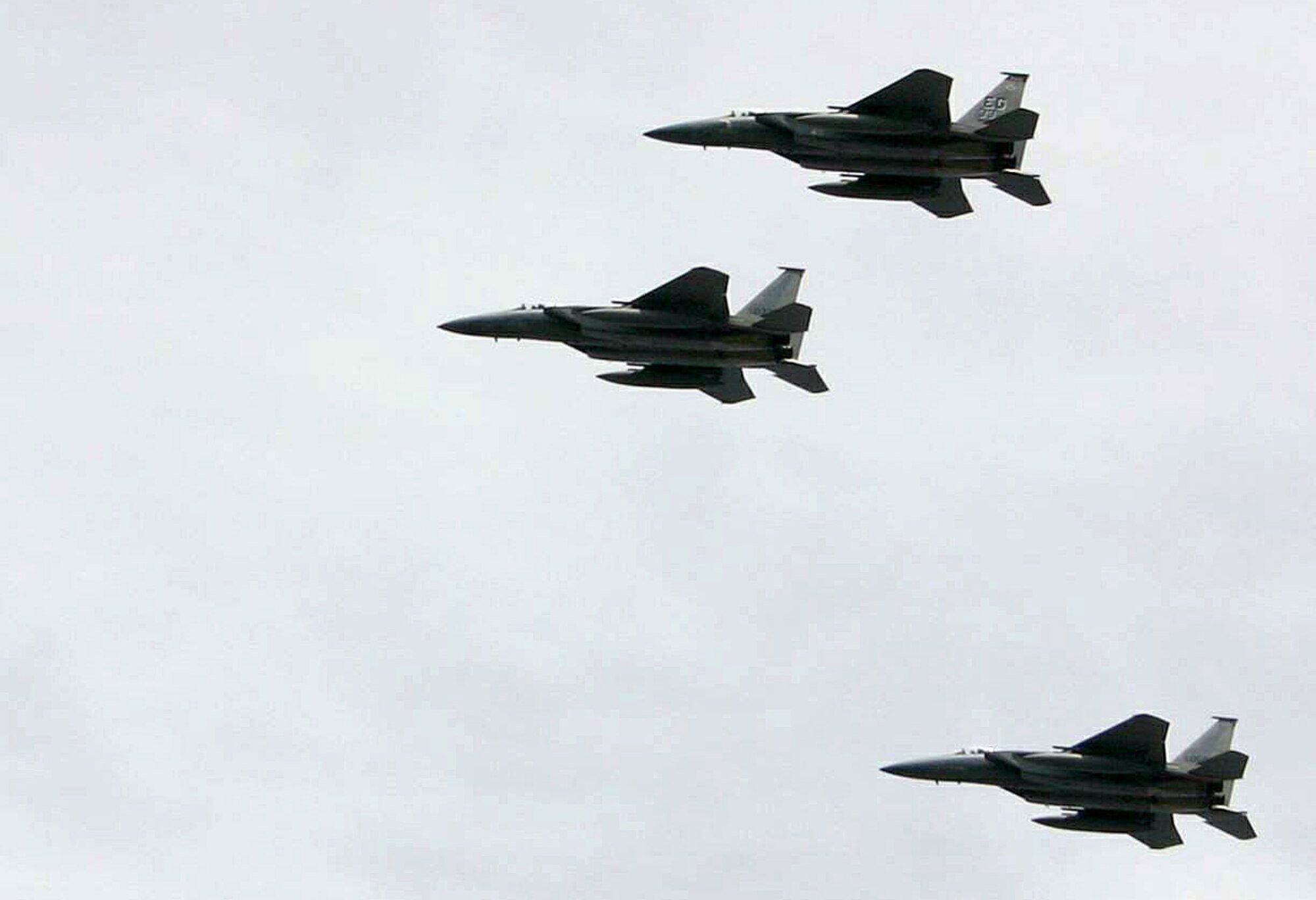 F-15 Eagles from the 33rd Fighter Wing from Eglin Air Force Base, Fla., fly in the missing man formation Sept. 20 over the National Tribute to Honor America's Fallen and Their Families in Washington, D.C. (U.S. Air Force photo/Senior Master Sgt. Raymond Sarracino) 
