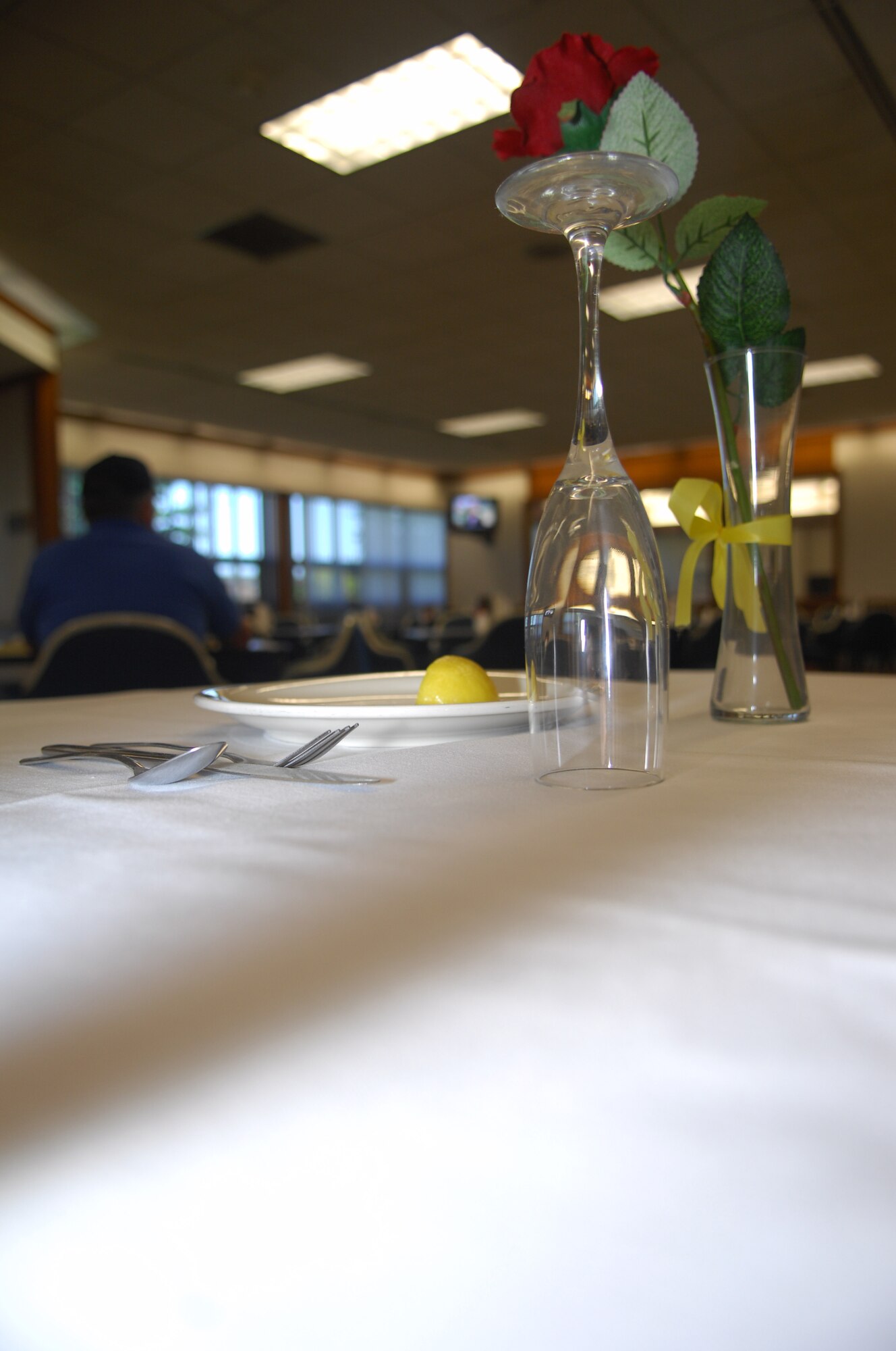 MINOT AIR FORCE BASE, N.D. -- The POW/MIA table on display at the Dakota Inn dining facility here is a way Minot AFB pays tribute to our brothers and sisters who cannot dine with us due to their sacrifice in defense of freedom. (U.S. Air Force photo by Airman 1st Class Benjamin Stratton)