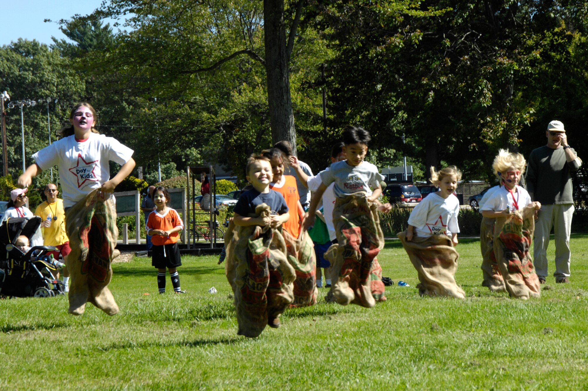 HANSCOM AFB, Mass. –Children participate in a sack race at the annual Boys and Girls Clubs of America Day for Kids. More than 300 children participated in the annual event at Castle Park on Sept. 20.  (U.S. Air Force photo by Linda LaBonte Britt)

