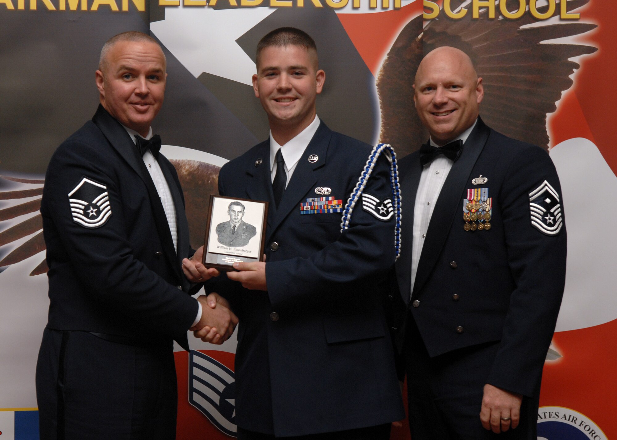 SPANGDAHLEM AIR BASE, Germany –- Staff Sgt. Ryan Conversi, 52nd Aircraft Maintenance Squadron, receives the William H. Pitsenbarger Leadership Award at the Airman Leadership School Graduation, class 08-6, Sept. 17, 2008. (U.S. Air Force photo by Airman Staci Miller)
