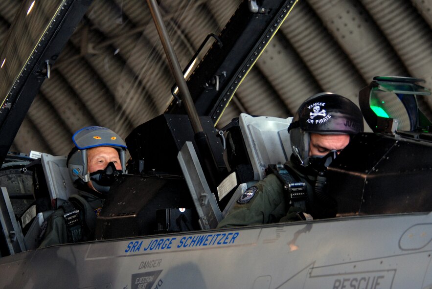 Gunsan City Mayor Dong Shin Moon and Col. Bryan "Wolf" Bearden, 8th Figher Wing commander, prepare for a high-speed taxi ride at Kunsan Air Base, Republic of Korea Sept. 23. Mayor Moon was participating in the Pilot for a Day program which is part of USFK's Good Neighbor Program.(U.S. Air Force photo by: Senior Airman Angela Ruiz)