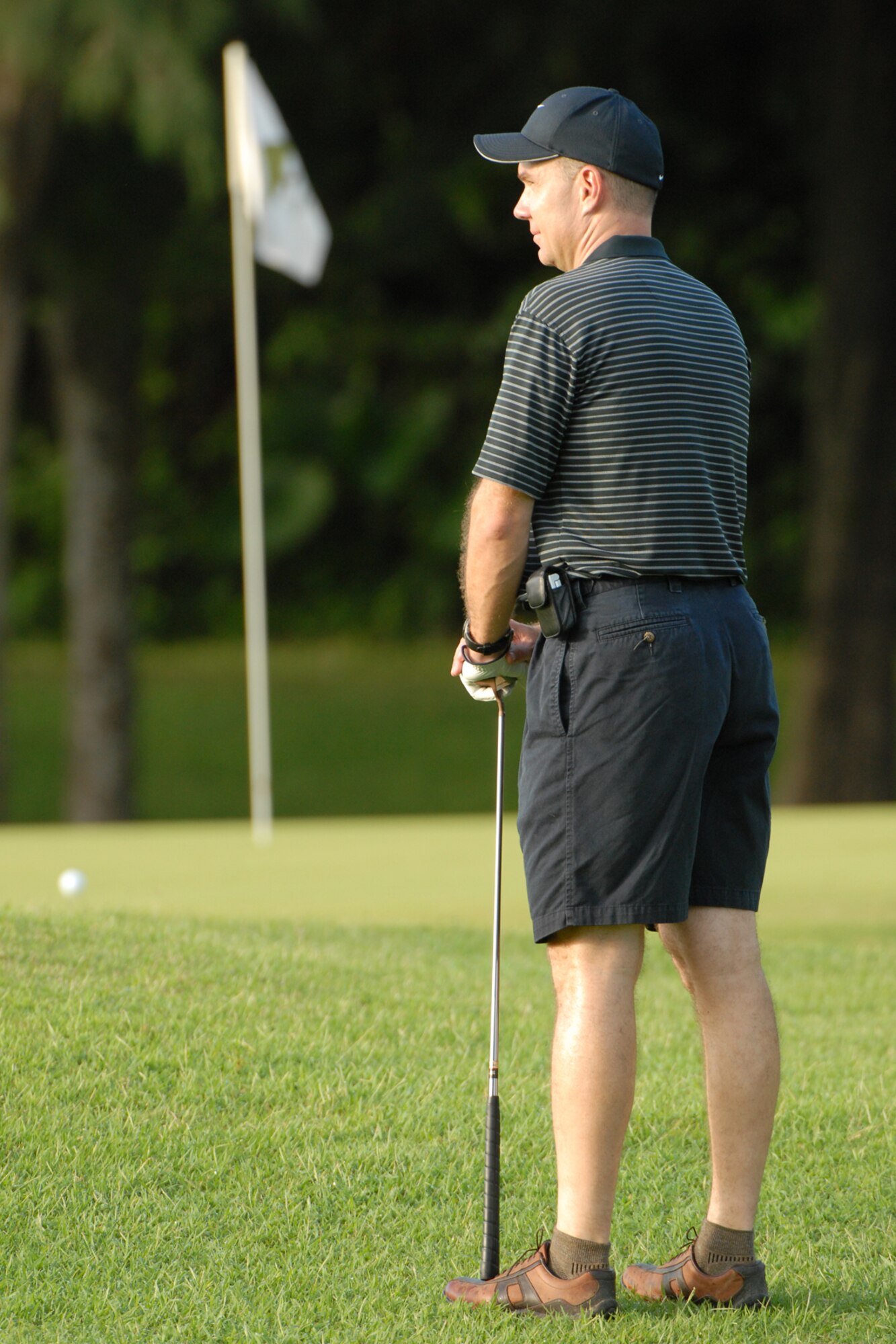 Col. Manson Morris, 18th Wing vice commander, waits for his shot during the Friendship Golf Tournament at Kadena Air Base, Japan Sept. 23, 2008. The annual tournament allows U.S. and Japanese military and community leaders to gather for a day of golf and camaraderie. (U.S. Air Force photo/Airman 1st Class Chad Warren)