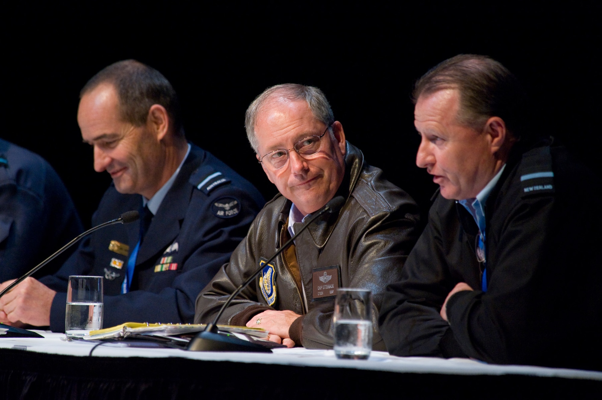 WELLINGTON, New Zealand-- Panel members at the 2008 Royal New Zealand Air Force Chief of Air Force Conference discussed security in the Pacific and airpower's future contribution.  Pictured (far left) is Air Commodore Mel Hupfeld, director of general operations for the Royal Australian Air Force, Lt. Gen. Chip Utterback, commander, 13th Air Force and (far right) Air Commodore Gavin J. Howse, air component commander, RNZAF. (NZ Defence Force photo by Cpl. Brad Hanson)