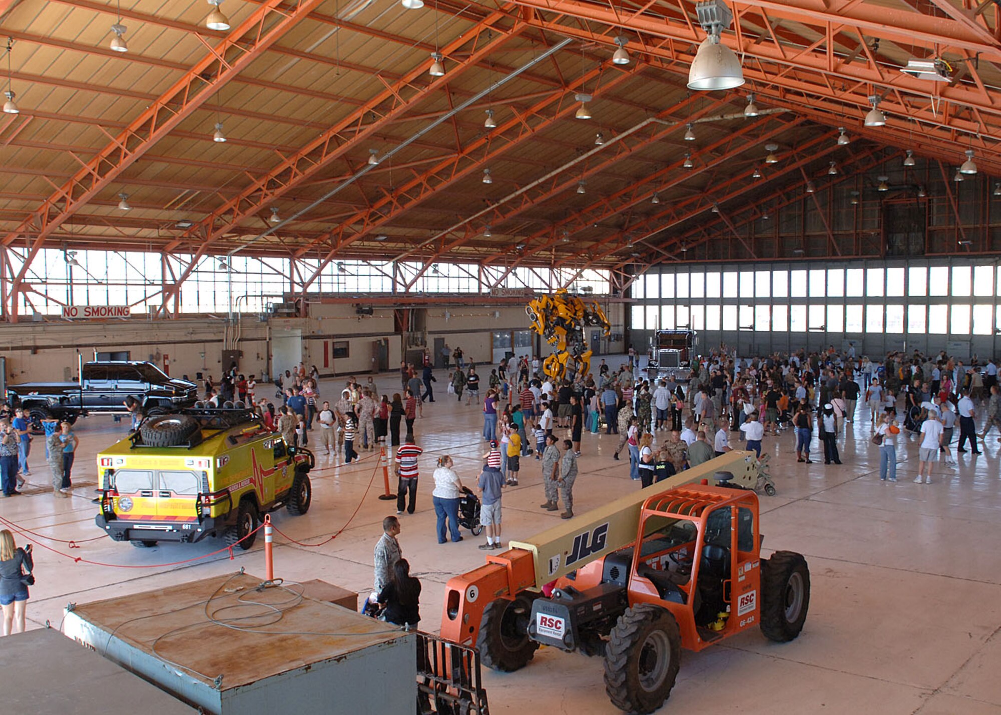 Members of the Holloman community gather at Hangar 500 to see cars from the movie Transformer 2, September 22, at Holloman Air Force Base, N.M.  Dream Works the major motion picture studio began filming Transformers 2 at Holloman Air Force Base and White Sands Missile Range early September.  (U.S. Air Force photo by Airman 1st Class John D. Strong II)
