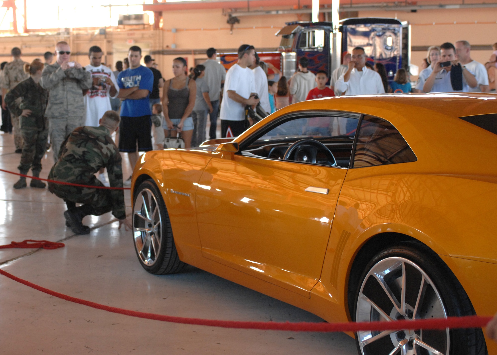 The new Chevrolet  Camaro, used as the transformater for ?Bumblebee,? a character in the Transformers 2 movie, sits out for all Holloman members to view in Hangar 500 at Holloman Air Force Base, N.M., September 22. Many viewers had the opportunity to get a photo with the cars from the movie.  (U.S. Air Force photo/Airman 1st Class Veronica Salgado)
