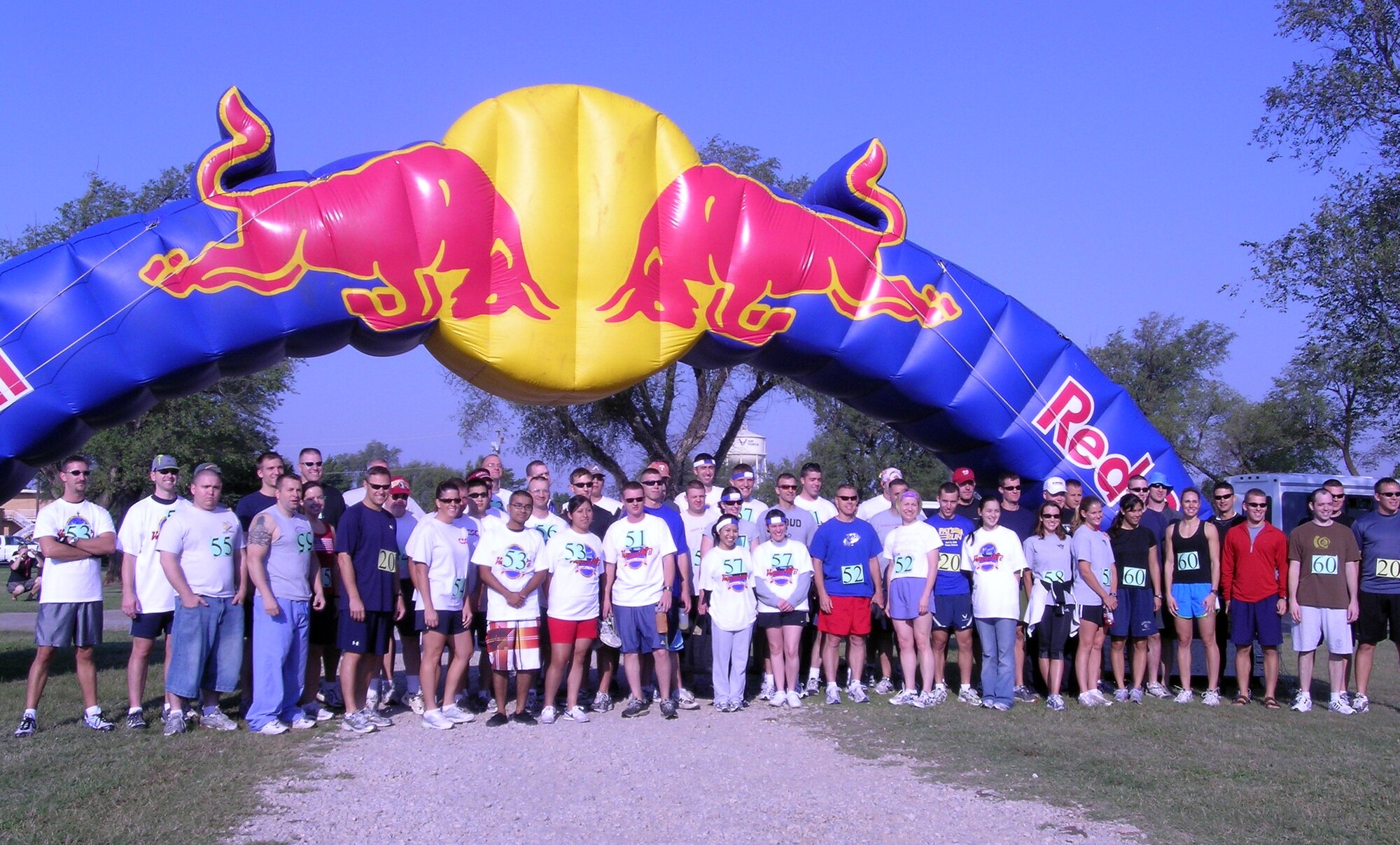 Fifty-eight participants in the Vance AFB 2008 Adventure Race, line up to start the four-mile run, two-mile raft paddle and 12-mile bicycle ride, Sept. 20. The race course ran from the base park to Meadowlake Park in Enid, Okla., and ended back on base. (U.S. Air Force photo by Sarah Putnam)