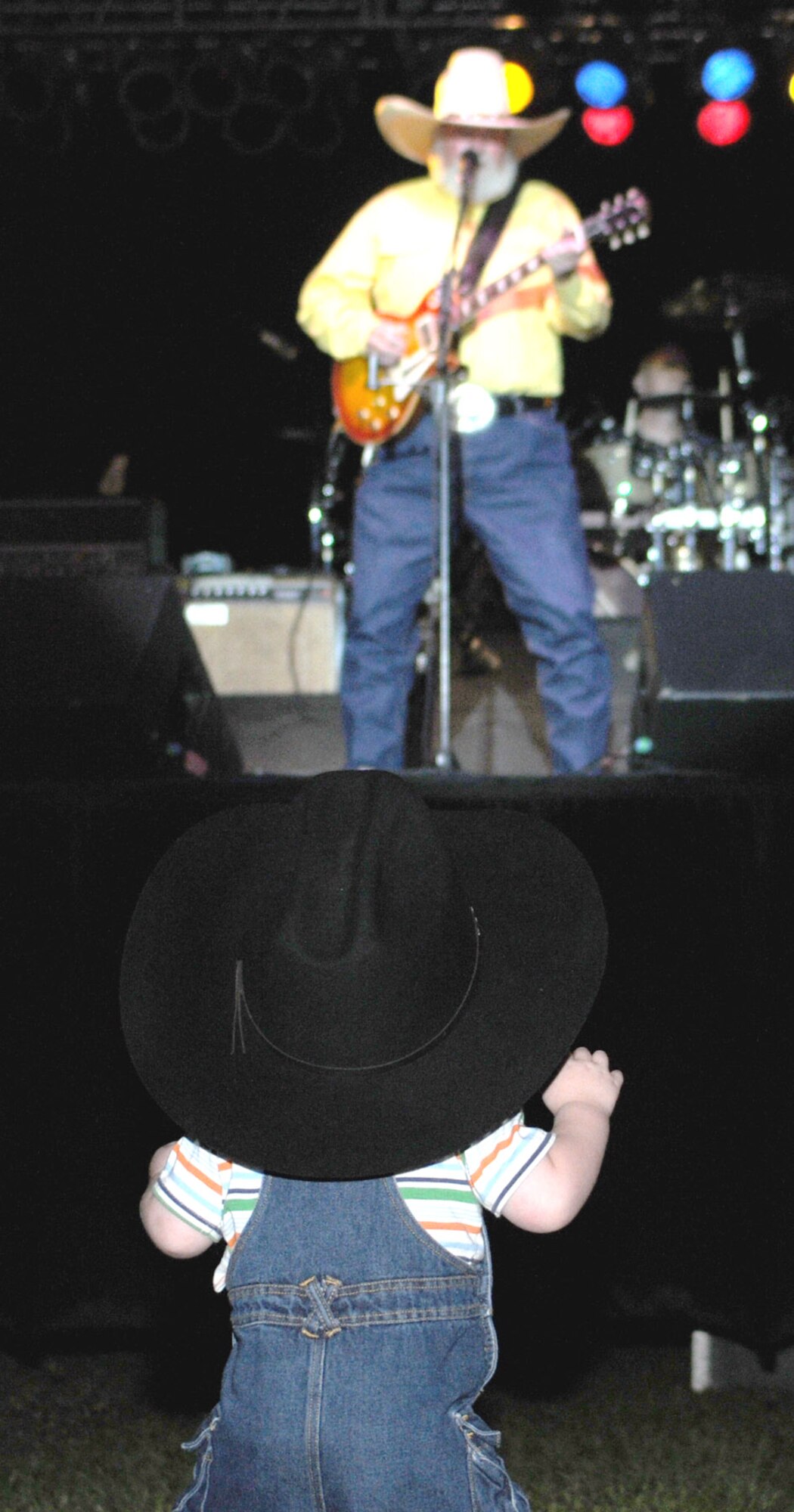 One-year-old Aaron Bartlett dances to the music of the Charlie Daniels Band at a concert celebrating the Air Force’s 61st birthday, Sept. 18.  Aaron’s grandfather is Sam Foster, 81st Training Wing.   (U.S. Air Force photo by Kemberly Groue)