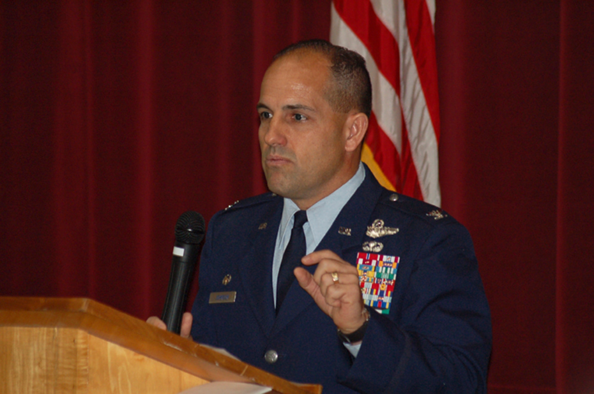 ELMENDORF AIR FORCE BASE, Alaska -- Col. Brent Johnson, 611th Air Support Group commander, addresses the faculty and students of Galena Interior Learning Academy, and other community members Sept. 23, at the former Galena Forward Operating Location. The assembly was to commemorate the exchange of facilities from the Air Force to the school. The Air Force facilities will formally become the property of the city of Galena Oct. 1. (U.S. Air Force photo/Tommie Baker)