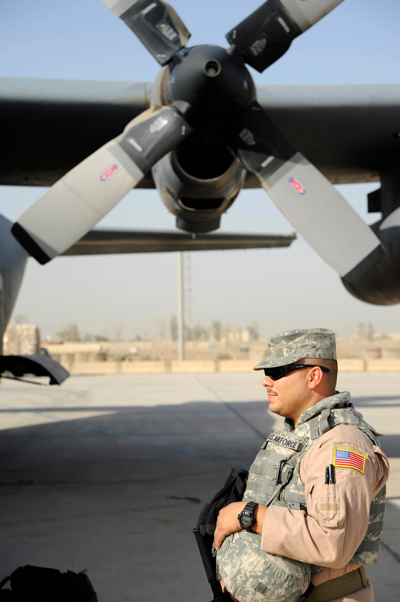 Master Sgt. Alex Diaz waits to board an Iraqi C-130 at Sept. 22 at an air base in Iraq. Sergeant Diaz is assigned to the an air advisor for the 370 Air Expeditionary Advisory Squadron and deployed from the 50th Airlift Squadron from Little Rock Air Force Base, Ark. (U.S. Air Force photo/Staff Sgt. Paul Villanueva II)
