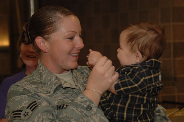 After six months in Afghanistan, member of the 433rd Civil Engineer Squadron returned home on Sept 22, 2008. Family and friends met them at San Antonio Airport with banners, cheers and even a few happy tears were shed during the reunion. The Alamo Wing engineers spent their deployment building and repairing structures at Bagram Airfield and several forward operating locations. They installed air conditioning units for Soldiers, brought older buildings up to U.S. Military construction codes and built brand new facilities. The group joined up with members of the Niagara Falls Air Force Reserve unit to create the first Prime BEEF, or Prime Base Emergency Engineer Force, team to operate in the country in almost two years.  (U.S. Air Force Photo/Master Sgt. Daniel Nathaniel)
