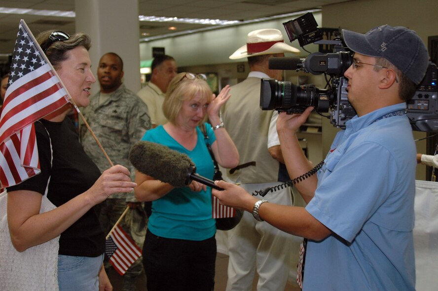 After six months in Afghanistan, member of the 433rd Civil Engineer Squadron returned home on Sept 22, 2008. Family and friends met them at San Antonio Airport with banners, cheers and even a few happy tears were shed during the reunion. The Alamo Wing engineers spent their deployment building and repairing structures at Bagram Airfield and several forward operating locations. They installed air conditioning units for Soldiers, brought older buildings up to U.S. Military construction codes and built brand new facilities. The group joined up with members of the Niagara Falls Air Force Reserve unit to create the first Prime BEEF, or Prime Base Emergency Engineer Force, team to operate in the country in almost two years.  (U.S. Air Force Photo/Master Sgt. Daniel Nathaniel)
