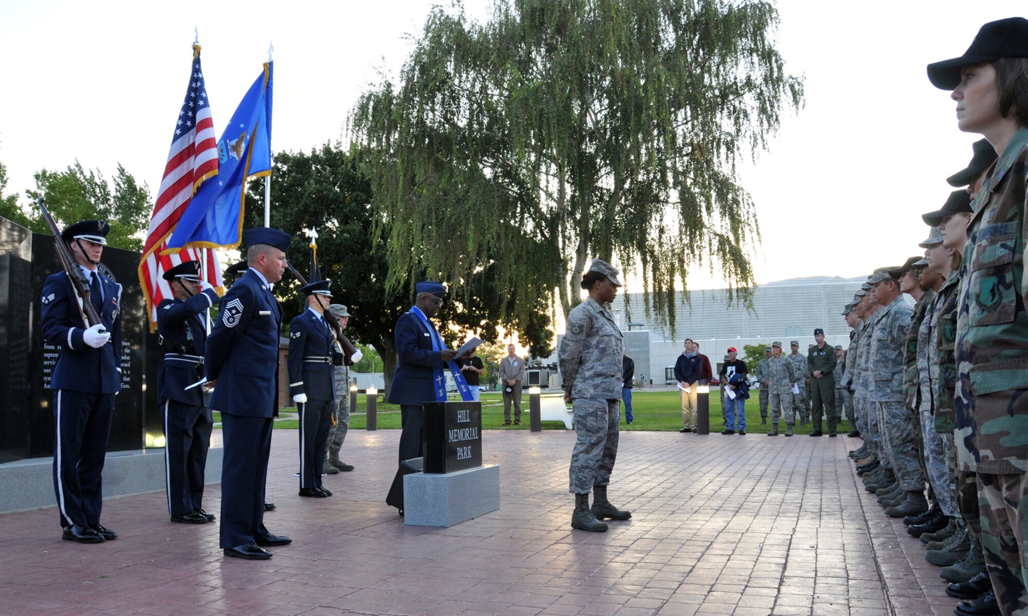 In Honor of POW/MIA day, servicemembers gathered at Hill Memorial Park for a revile ceremony Sept. 19. The ceremony included a prayer from Chap. (Lt. Col.) Carl Wright, 75th Air Base Wing chaplain, and a speech by Chief Master Sgt. Kevin Candler, Ogden Air Logistics Center and 75th Air Base Wing command chief. (U.S. Air Force Photo by Billy Arrowood)