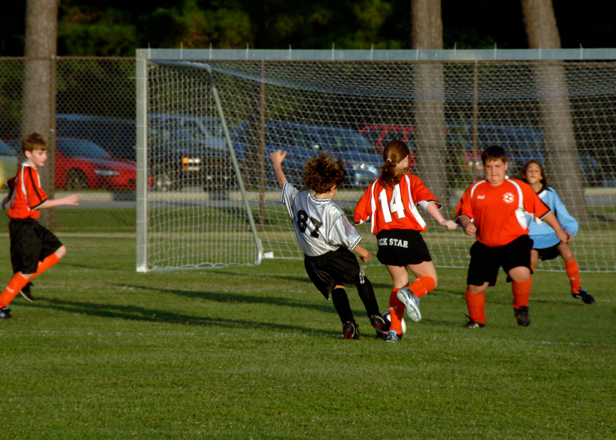 Alex Hammond, number 87, takes a shot at the goal during the first quarter of the game at the base soccer field Sept. 22. The Hanahan Starz defeated the Silver Bullets 2-1. (U.S. Air Force photo/Airman 1st Class Timothy Taylor)