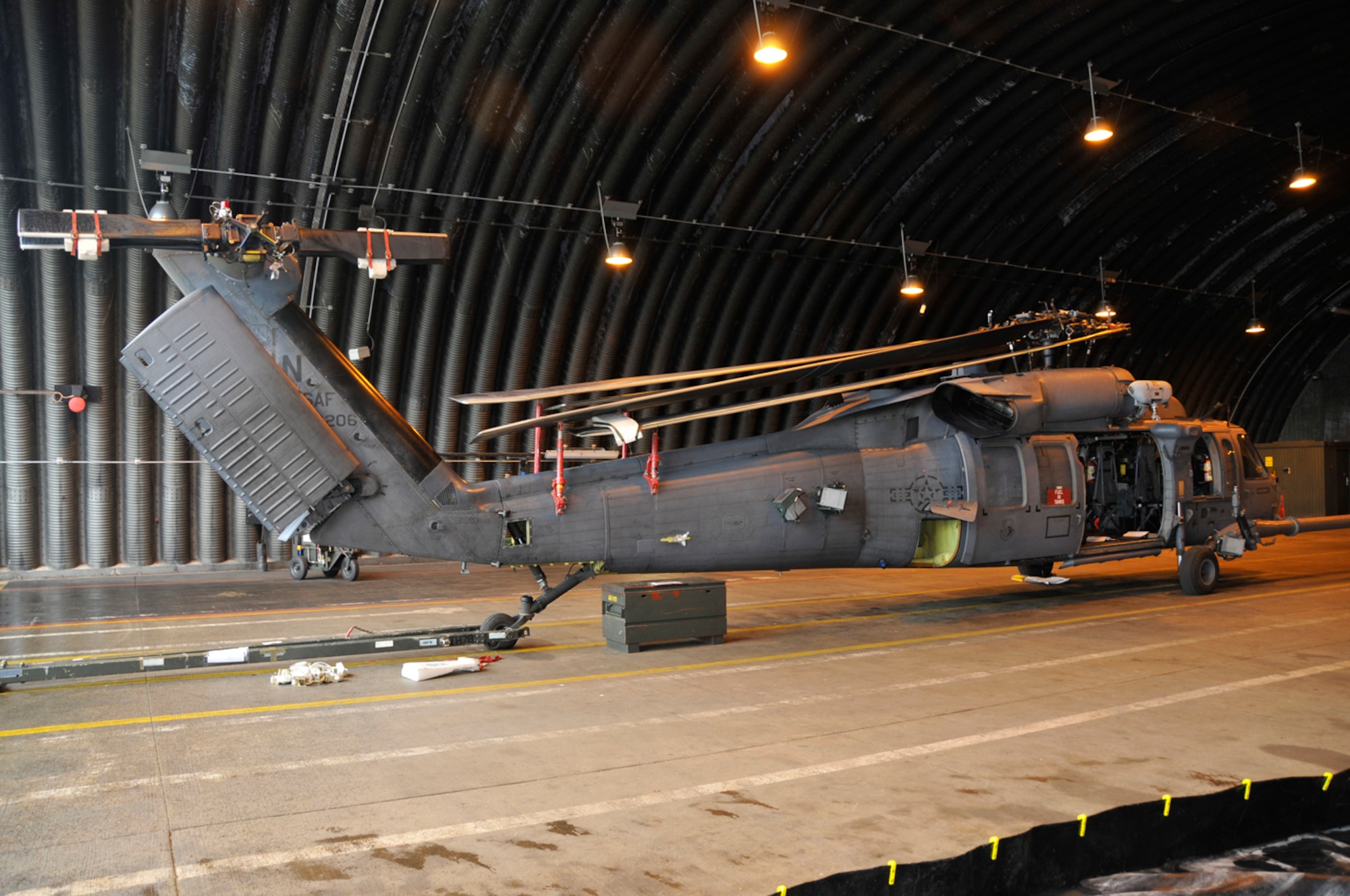 An HH-60G Pave Hawk helicopter sits folded up and ready for shipment Sept. 11 at RAF Lakenheath, England. The Pave Hawk will be loaded onto a C-17 Globemaster III to transport it to a deployed location. (U.S. Air Force photo by Airman 1st Class Perry Aston)