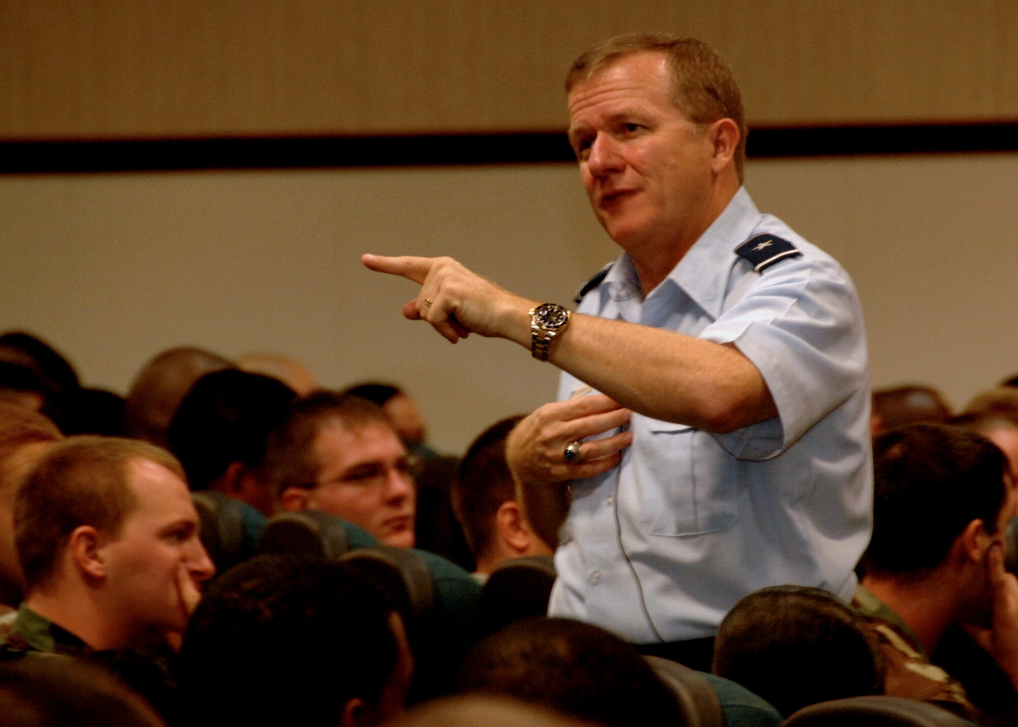 ANDERSEN AIR FORCE BASE, Guam - Brigadier Gen. Phil Ruhlman, 36th Wing commander, speaks to Team Andersen Airmen Sept. 24 at his first commander’s call since he assumed command Sept. 2. Gen. Ruhlman spoke about the expectations he has for the Airmen and his plans for the future of the wing. Gen. Ruhlman also answered any questions the Airmen had about the Air Force and the base. (U.S. Air Force photo by Airman 1st Class Nichelle Griffiths)  