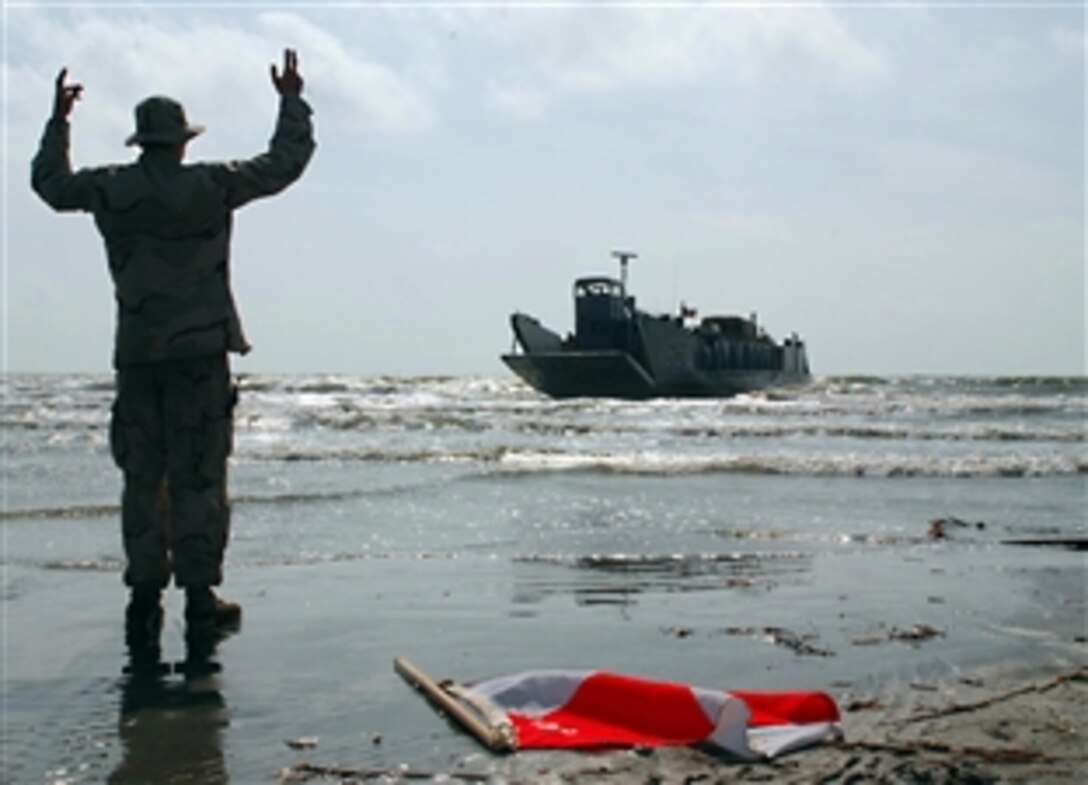 Beach Master Unit 2 departs the beach in Galveston aboard a landing craft utility before returning to the amphibious assault ship USS Nassau, Sept. 23, 2008. Nassau is anchored off the coast of Galveston to support civil authorities in disaster recovery as directed in the wake of Hurricane Ike.