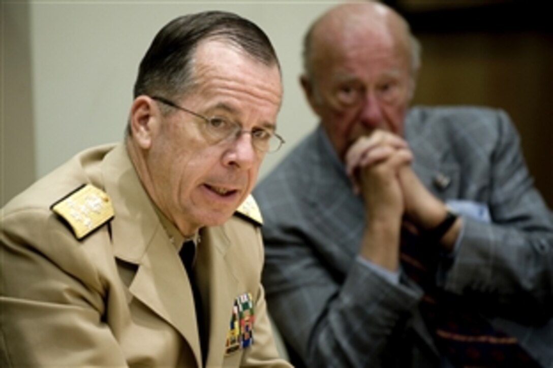 U.S Navy Adm. Mike Mullen, chairman of the Joint Chiefs of Staff, addresses former Secretary of State George Shultz and Hoover Institution members at Stanford University in Palo Alto, Calif., Sept. 24, 2008. The institution is a public policy research center within Stanford devoted to the advanced study of politics, economics, and political economy.