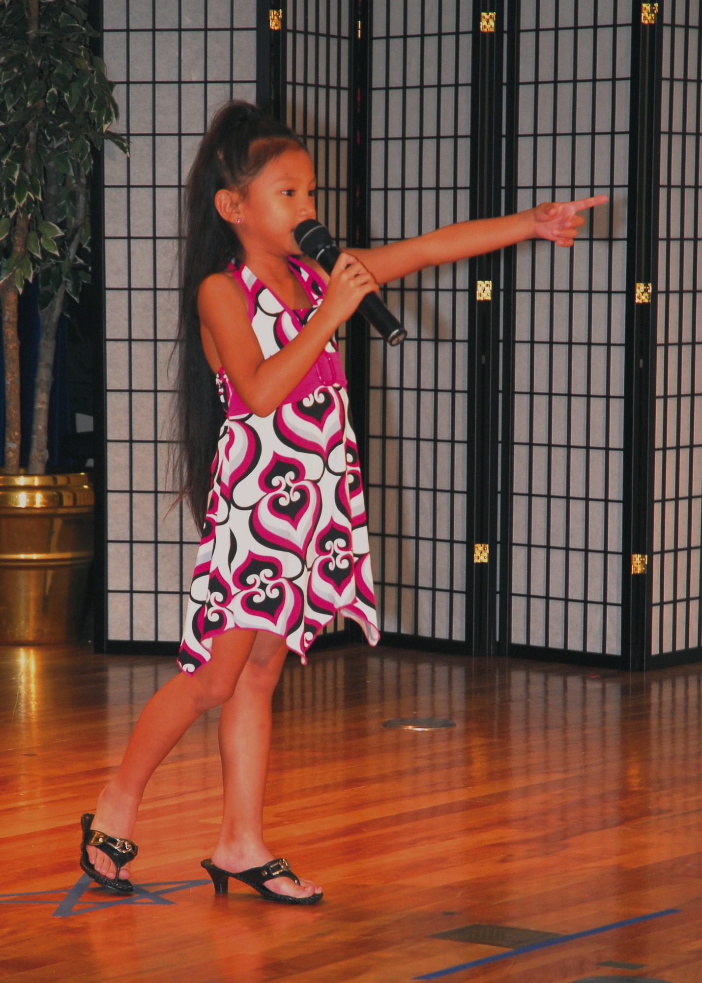 Taylore Gilmore performs Fergie’s “Clumsy” at the Family and Teen Talent Show at the Schilling Community Center Sept. 20, 2008. (U.S. Air Force photo/Airman 1st Class Amanda Grabiec)