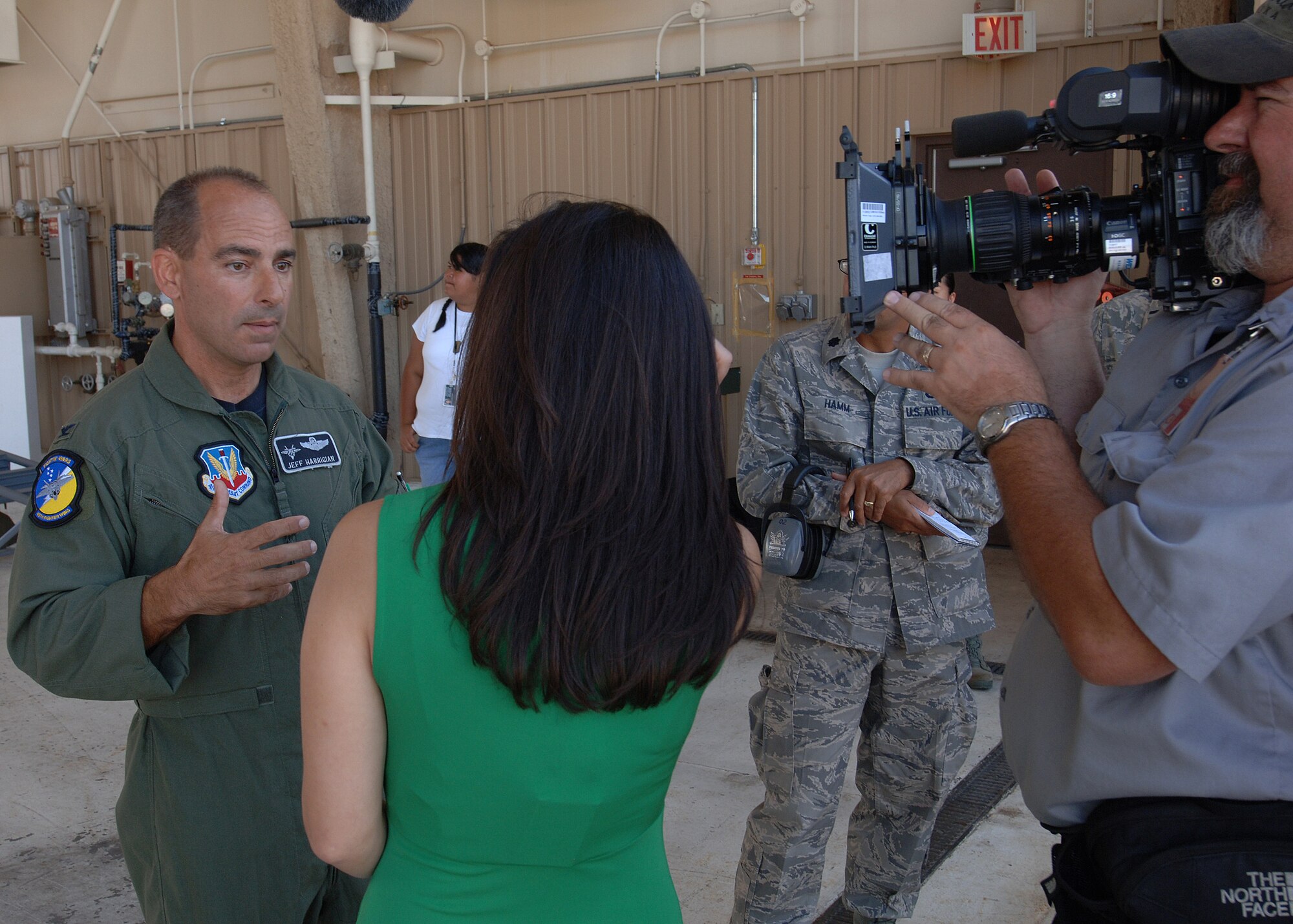 "The Insider"'s Victoria Recano interviews Col. Jeff Harrigian, 49th Fighter Wing commander, September 19 at Holloman Air Force Base, N.M. "The Insider" was given access to director Michael Bay's "Transformers: Revenge of the Fallen" while filming at Holloman and White Sands Missile Range.  (U.S. Air Force photo/Airman 1st Class Michael Means)
