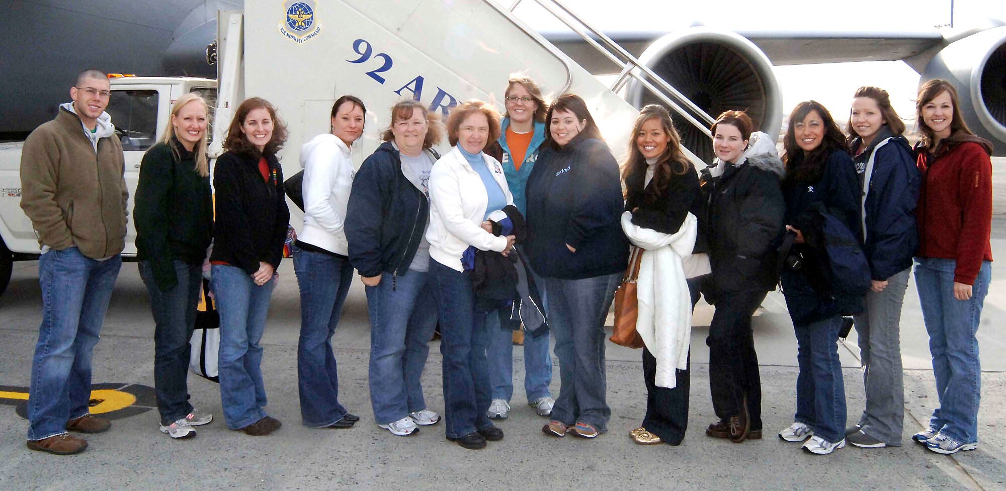 FAIRCHILD AIR FORCE BASE, Wash. – Spouses of deployed members from Fairchild pose before boarding a KC-135 Stratotanker Sept. 24. The spouses took part in an orientation flight as part of an ongoing program that familiarizes spouses with a routine operational day. The day included a preflight brief, a four-hour flight and a post brief. (U.S. Air Force photo / Staff Sgt. JT May III)
