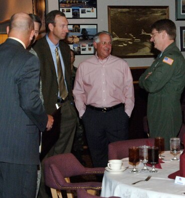 FAIRCHILD AIR FORCE BASE, Wash. – Col. Robert Thomas, 92nd Air Refueling Wing commander, mingles with prominent members of the local community at Club Fairchild Sept. 23. An assortment of business leaders, volunteers and military leaders gather once a year at Fairchild to become acquainted and brief their individual missions. (U.S. Air force photo / Airman 1st Class Melissa Barnett)
