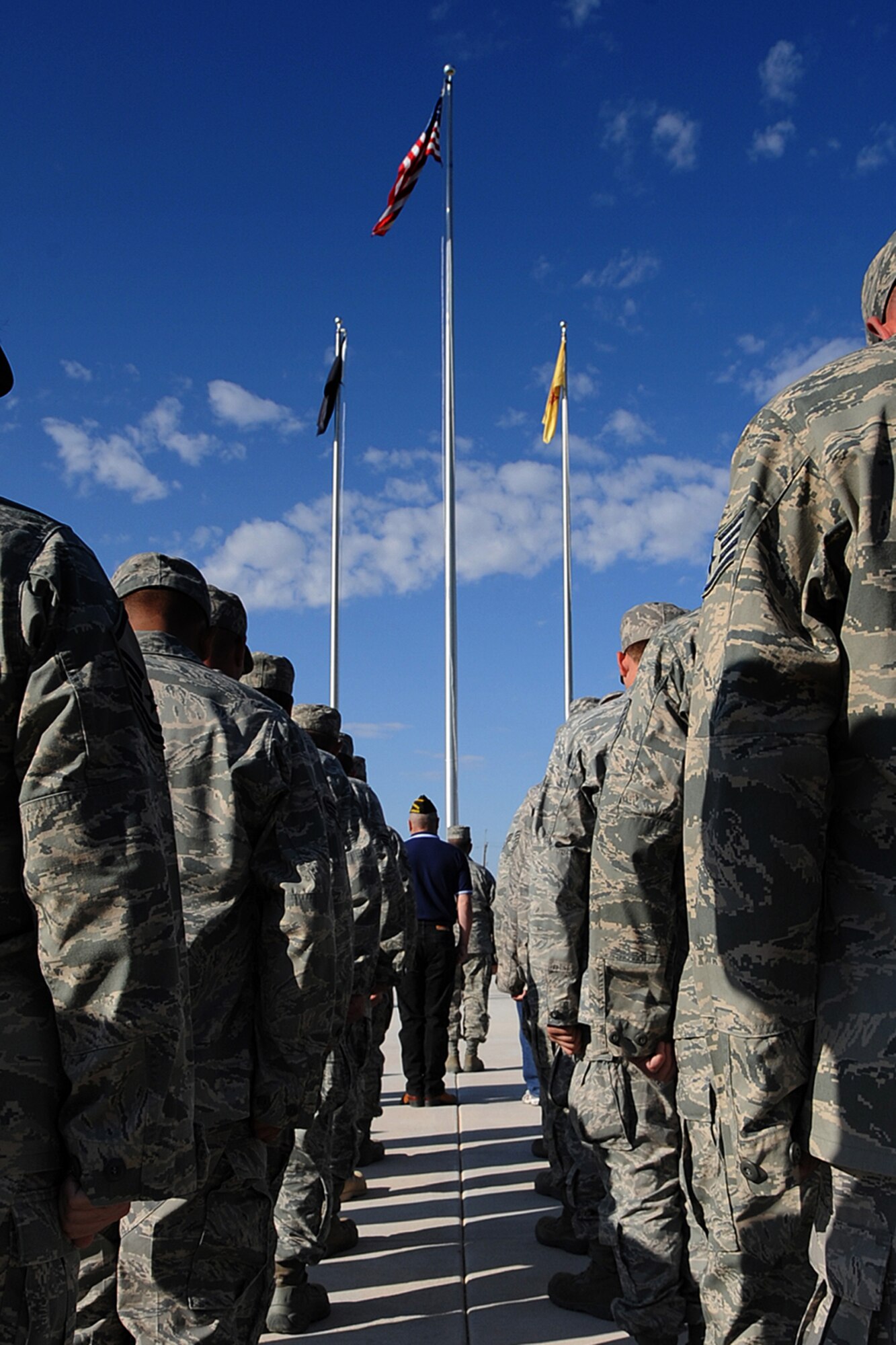 Members of the 49th Fighter Wing stand in formation during the Prisoners of War/ Missing in Action Day ceremony held September 23  at Holloman AFB, N.M. (U.S. Air Force photo/ Staff Sgt. Chris Flahive)