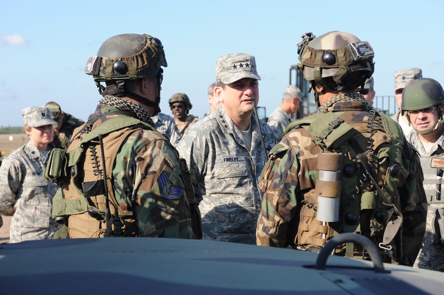 Lt. Gen. Vern "Rusty" Findley, Air Mobility Command vice commander, talks with Airmen from the 816th Contingency Response Group of McGuire Air Force Base, N.J., during a tour of Air Force Exercise Eagle Flag 08-6 Sept. 23, 2008, at Naval Air Engineering Station Lakehurst, N.J.  General Findley visited McGuire and the U.S. Air Force Expeditionary Center on Fort Dix, N.J., to learn more about expeditionary training and operations in both areas.  (U.S. Air Force Photo/Staff Sgt. Nathan Bevier)