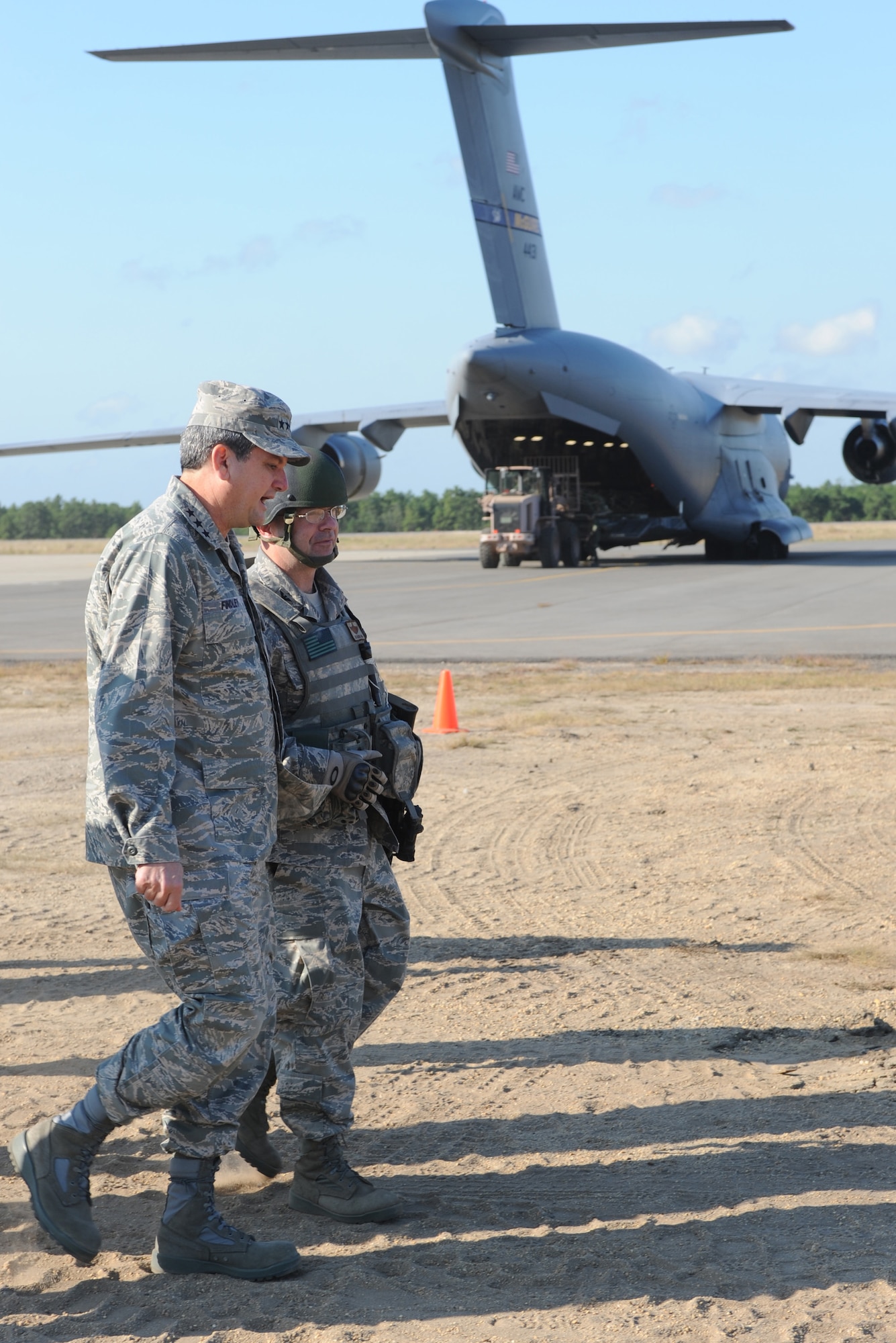 Lt. Gen. Vern "Rusty" Findley, Air Mobility Command vice commander, walks with Col. Jim Hamilton, 816th Contingency Response Group commander from McGuire Air Force Base, N.J., as part of a tour of the CRG camp area and Eagle Flag Sept. 23, 2008, at Naval Air Engineering Station Lakehurst, N.J.  Besides Eagle Flag, General Findley visited the U.S. Air Force Expeditionary Center on Fort Dix, N.J., and McGuire to learn more about training and operations taking place in all areas.  (U.S. Air Force Photo/Staff Sgt. Nathan Bevier) 