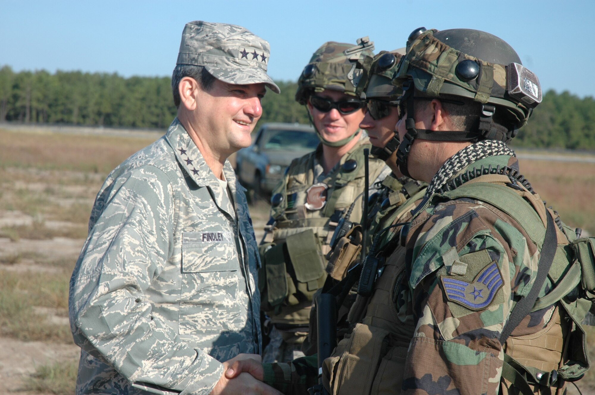 Lt. Gen. Vern "Rusty" Findley, Air Mobility Command vice commander, talks with Airmen from the 816th Contingency Response Group of McGuire Air Force Base, N.J., during a tour of Air Force Exercise Eagle Flag 08-6 Sept. 23, 2008, at Naval Air Engineering Station Lakehurst, N.J.  General Findley visited McGuire and the U.S. Air Force Expeditionary Center on Fort Dix, N.J., to learn more about expeditionary training and operations in both areas.  (U.S. Air Force Photo/Tech. Sgt. Scott T. Sturkol)
