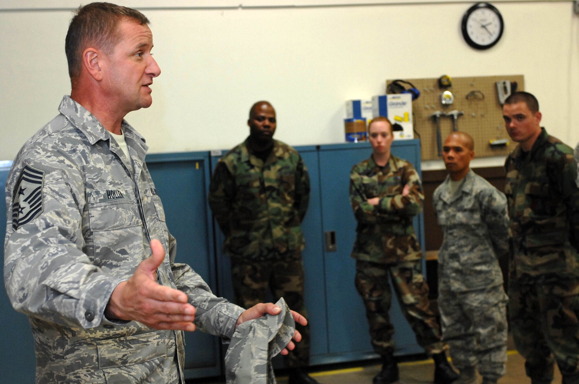 Chief Master Sgt. Lloyd Hollen, 12th Air Force command chief, speaks with Ellsworth Airmen at the 28th Logistics Readiness Squadron on Sept. 24. Chief Hollen spoke of many topics, including the Air Force mission in Southwest Asia, and answered questions. (U.S. Air Force photo by Airman Corey Hook)