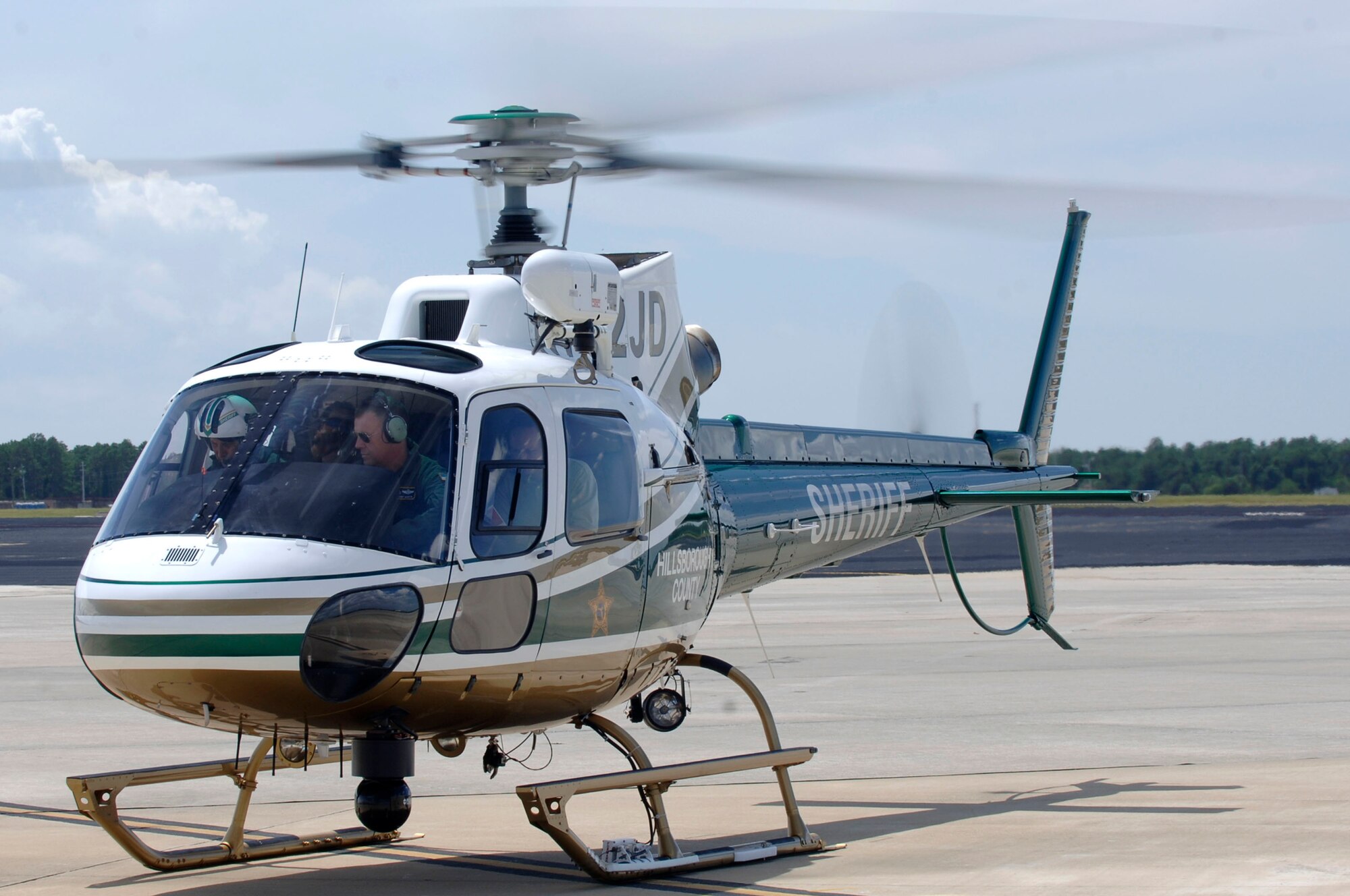 6 AMW Commander Colonel Larry Martin recieves a ride in a Hillsborough County Sheriff's Aviation Section helicopter piloted by Kevin Langiotti at MacDill AFB on September 23, 2008.  The Hillsborough County Sherriff's department was giving Colonel Martin an aerial tour of the base.

(U.S. Air Force Photo by Staff Sergeant Joseph L. Swafford Jr.) (Released)
