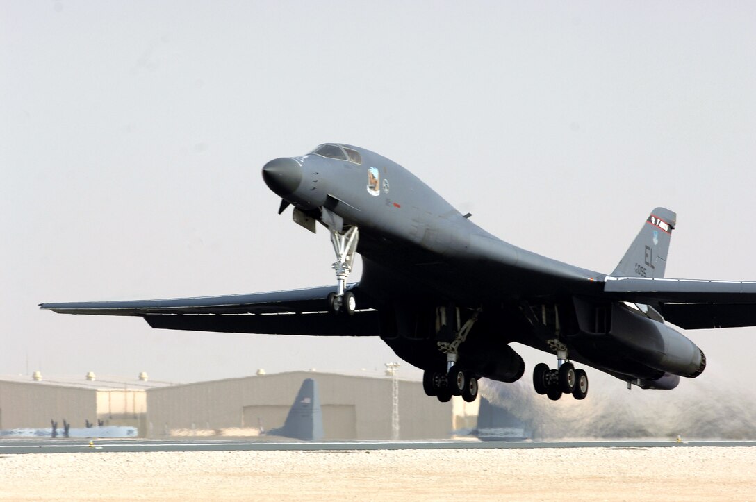 A B-1B Lancer takes off from a base in Southwest Asia to support Operations Enduring and Iraqi Freedom. The B-1B has the capability to carry guided and unguided weapons and deliver massive quantities of precision and non-precision weapons against specific targets. (U.S. Air Force photo)