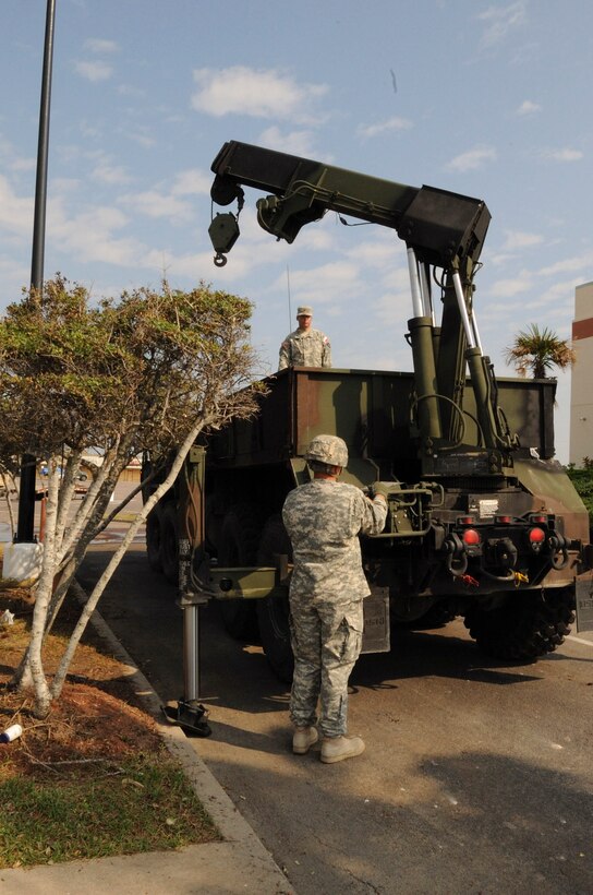 Army Specialist Daniel Harper and Army Sergeant Jeff Layer, Texas MIlitary Forces delivers a generator to power up wash point stations  for soldiers supporting Task Force 36 IDHQ Hurricane Ike sustainment at Galveston, Texas. September 18, 2008