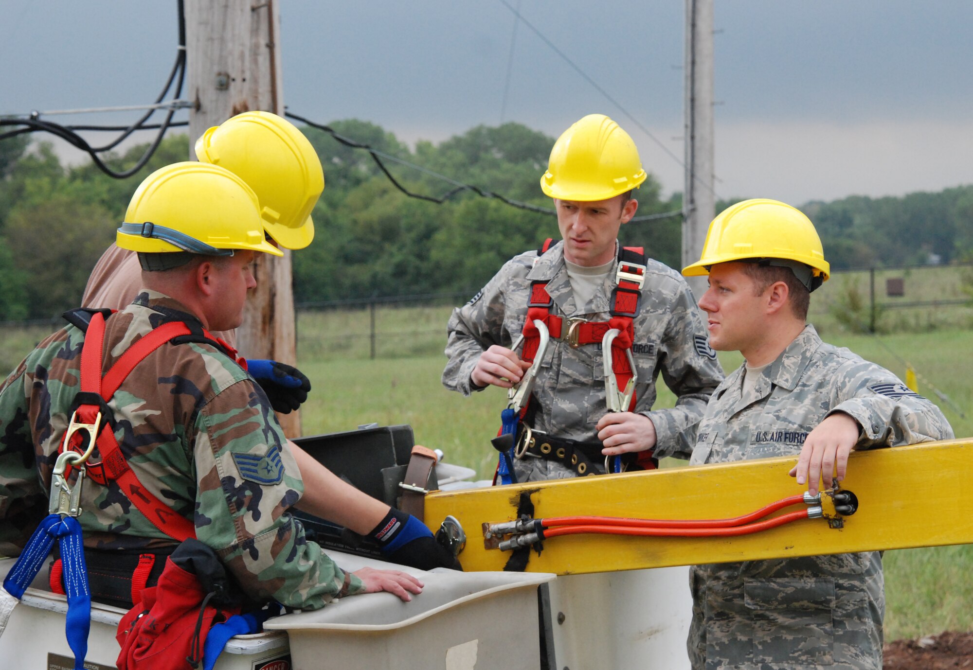 MCCONNELL AIR FORCE BASE, Kan. -- Safety briefs are constantly given at the air to ground transmit receiver tower site Sept. 8,  to ensure  Airmen can identify and operate the safety pieces of their harnesses before they provide installation and maintenance on the 70 foot towers. (photo by Airman 1st Class Jessica Lockoski)
